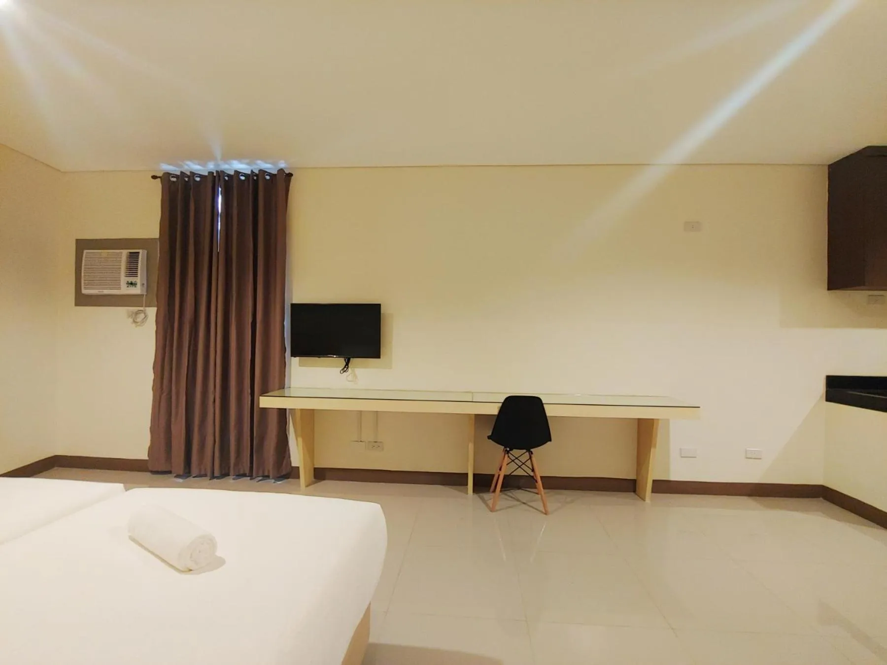 Photo of the whole room, Bed in Kaizen Suites