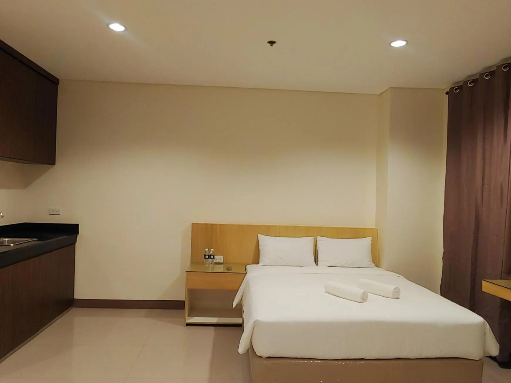 Photo of the whole room, Bed in Kaizen Suites
