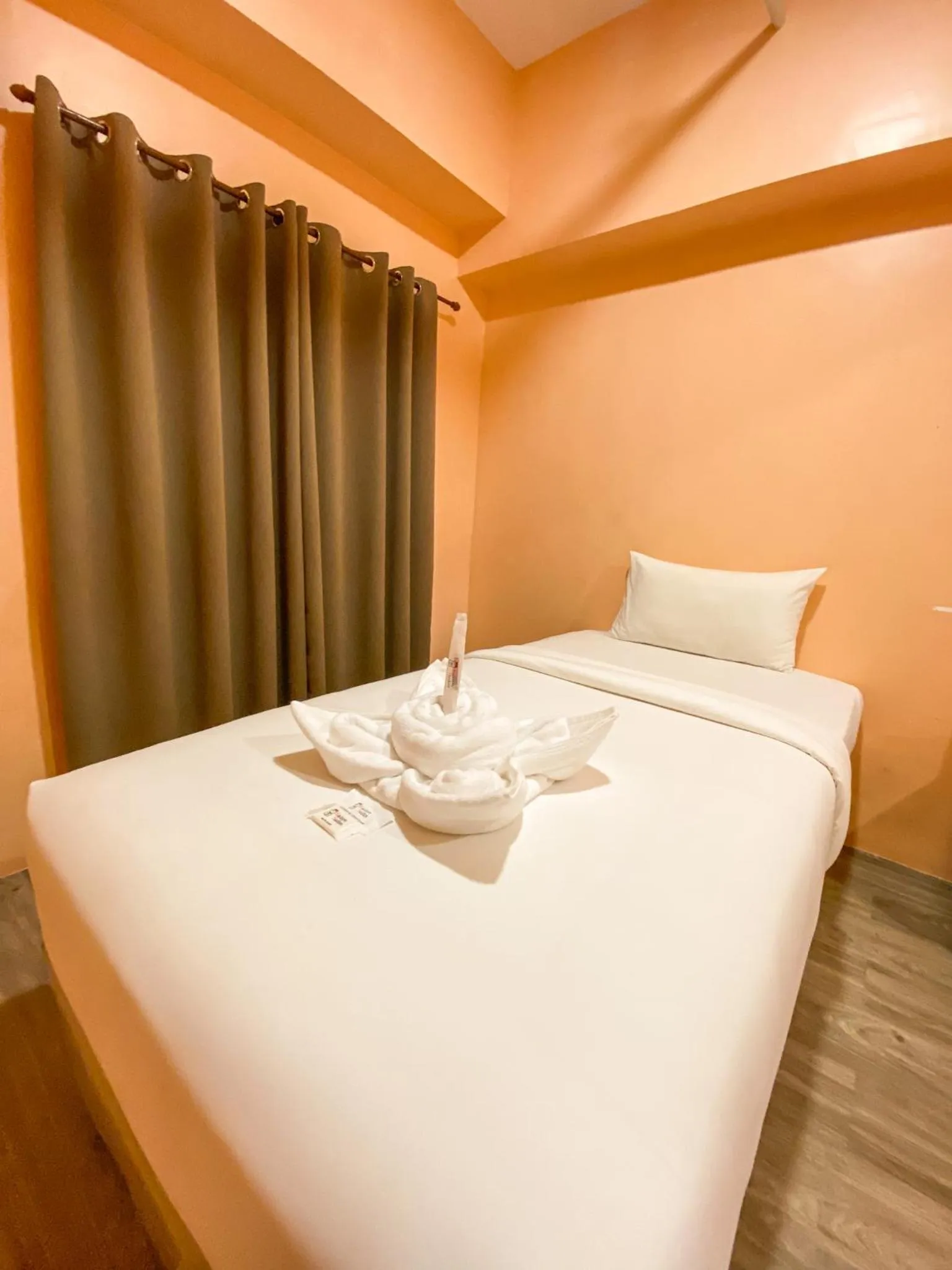 Bed in Kaizen Suites