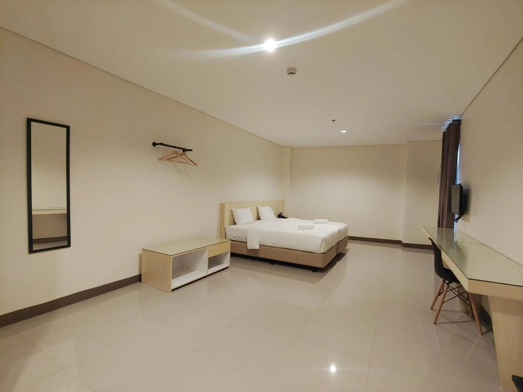 Photo of the whole room, Bed in Kaizen Suites