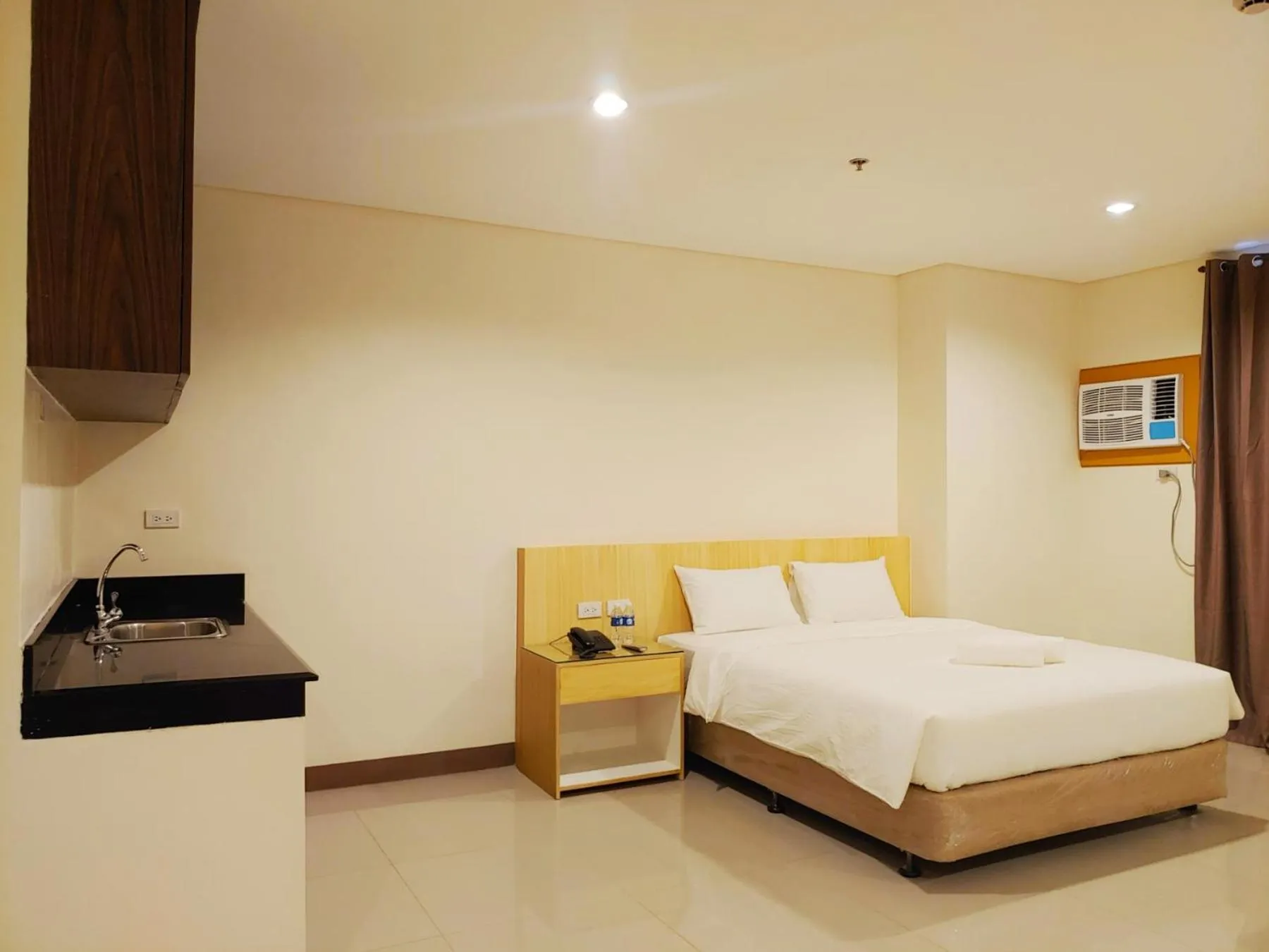 Bed in Kaizen Suites