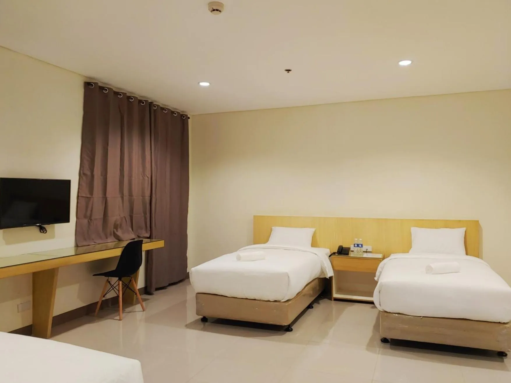Photo of the whole room, Bed in Kaizen Suites