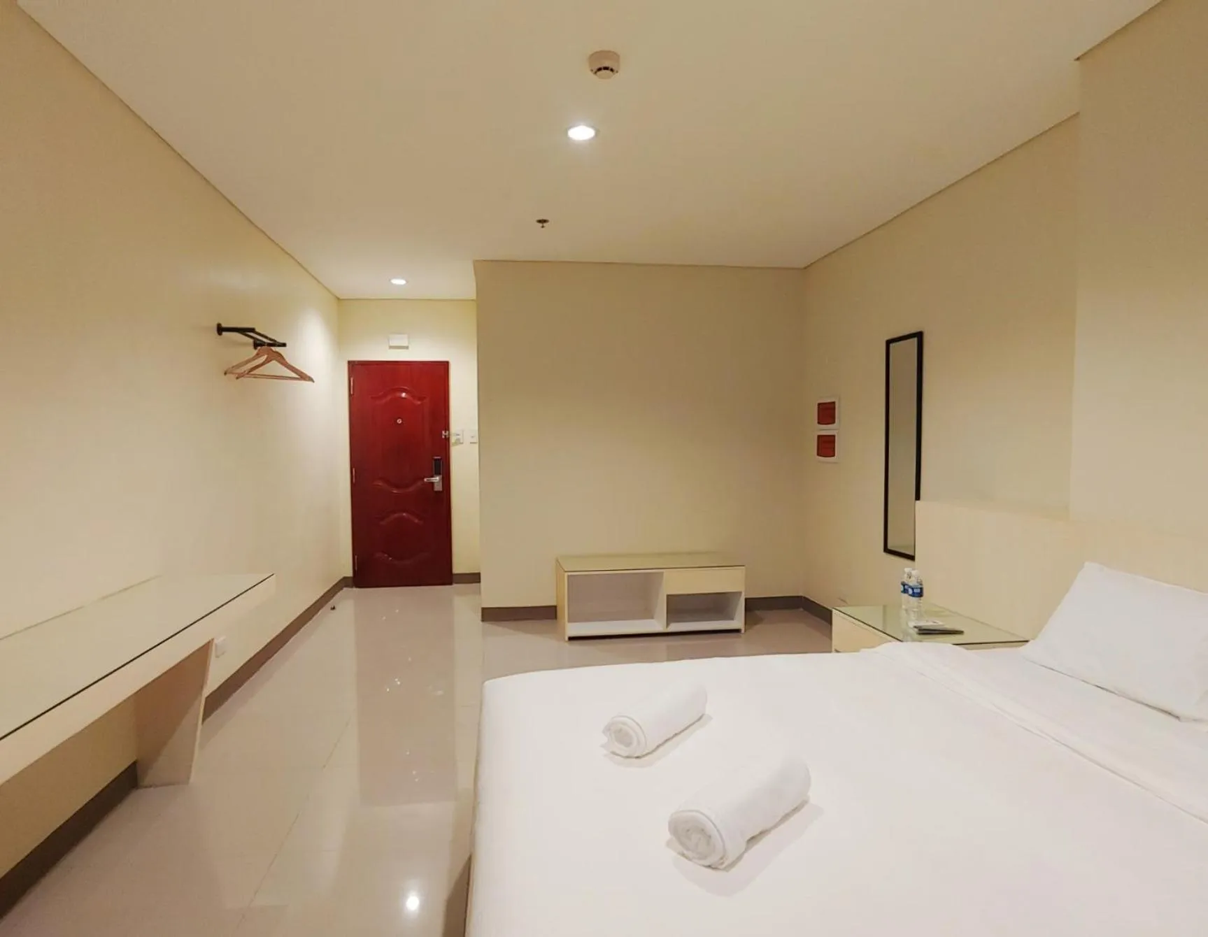 Photo of the whole room, Bed in Kaizen Suites