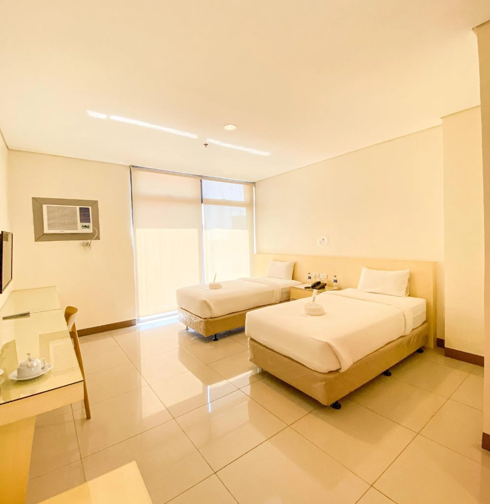 Bed in Kaizen Suites