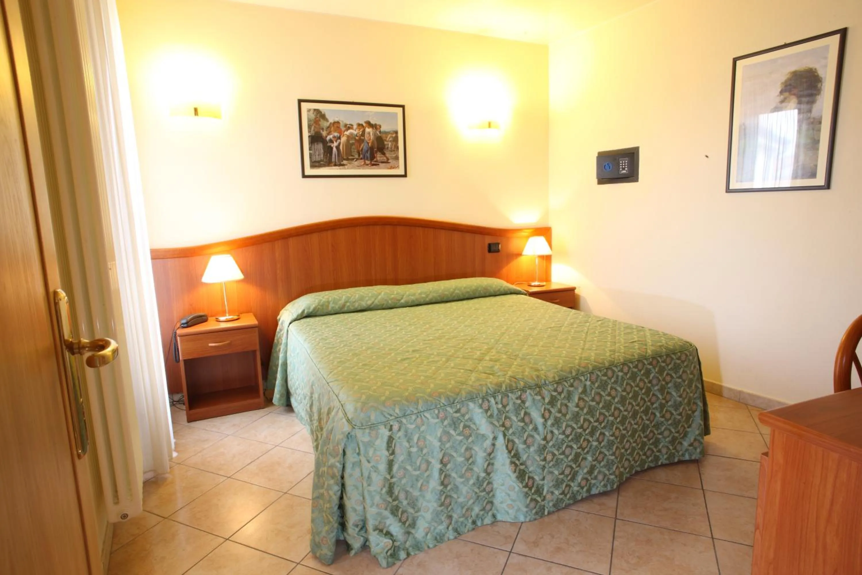 Bed in Albergo Alla Campana