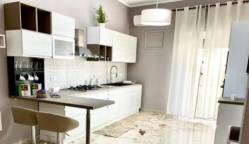 Kitchen or kitchenette in AMATI HOLIDAYS