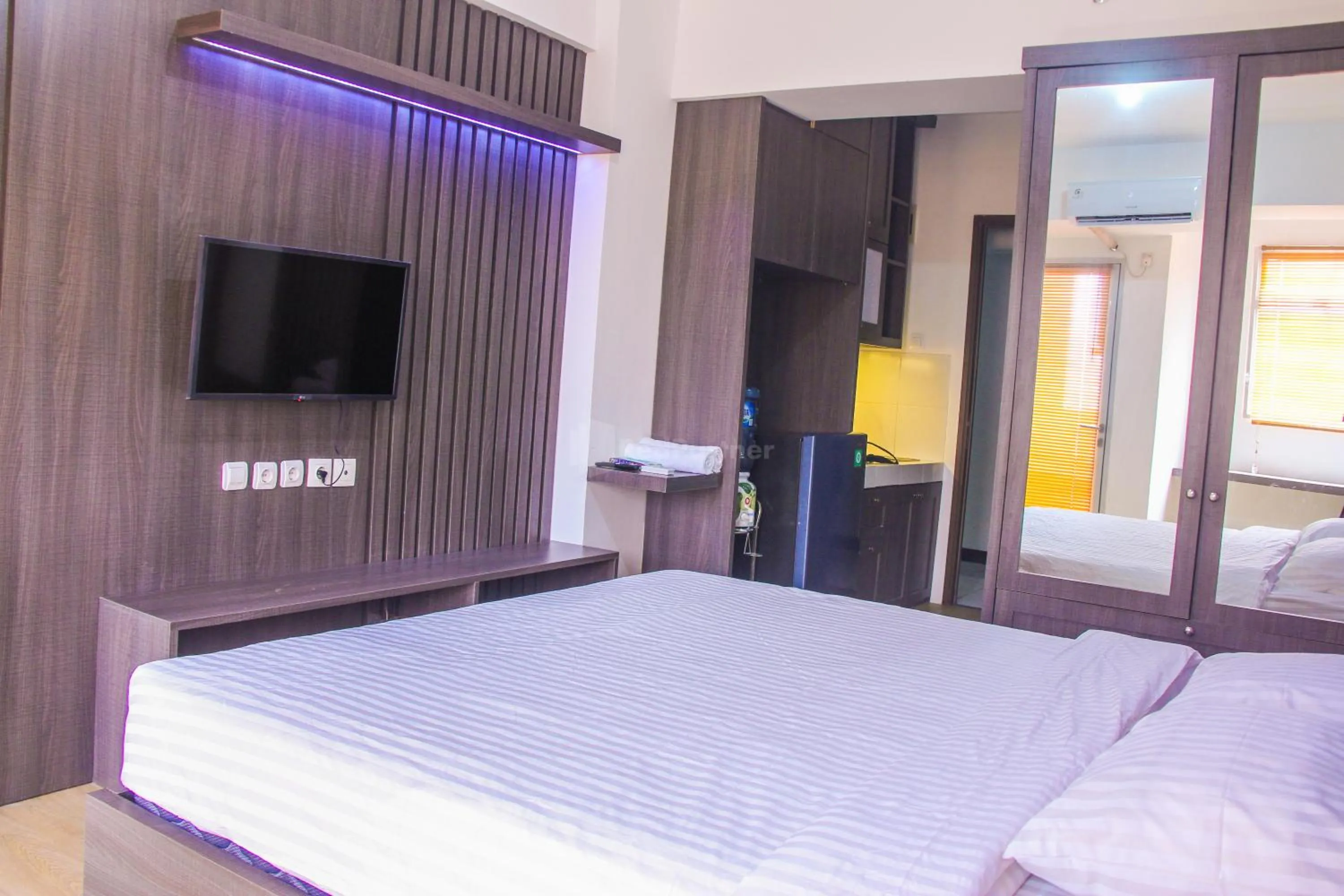 Bedroom in RedLiving Apartemen Gunung Putri Square - Abidin Room Tower Pinus