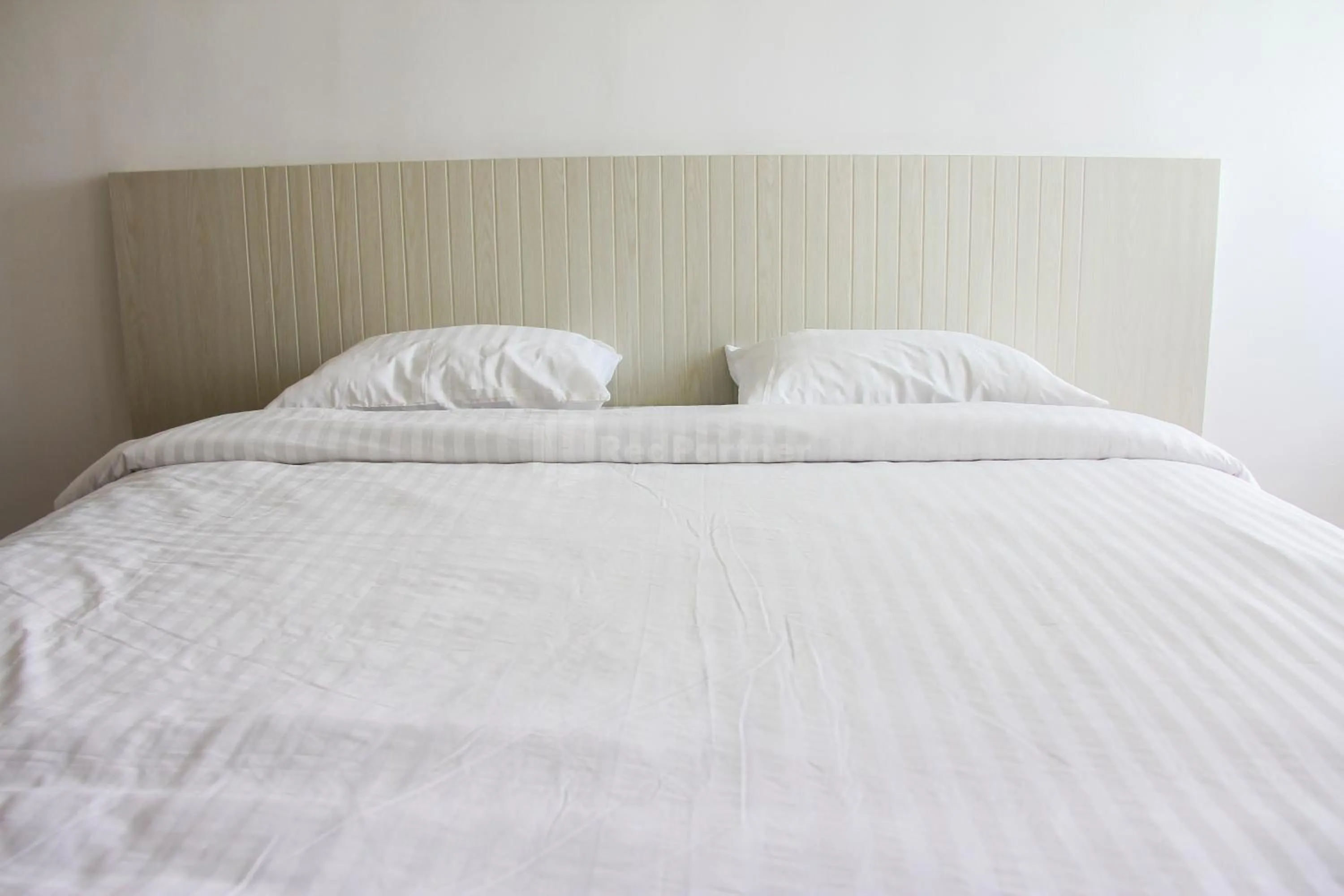 Bedroom in RedLiving Apartemen Gunung Putri Square - Abidin Room Tower Pinus