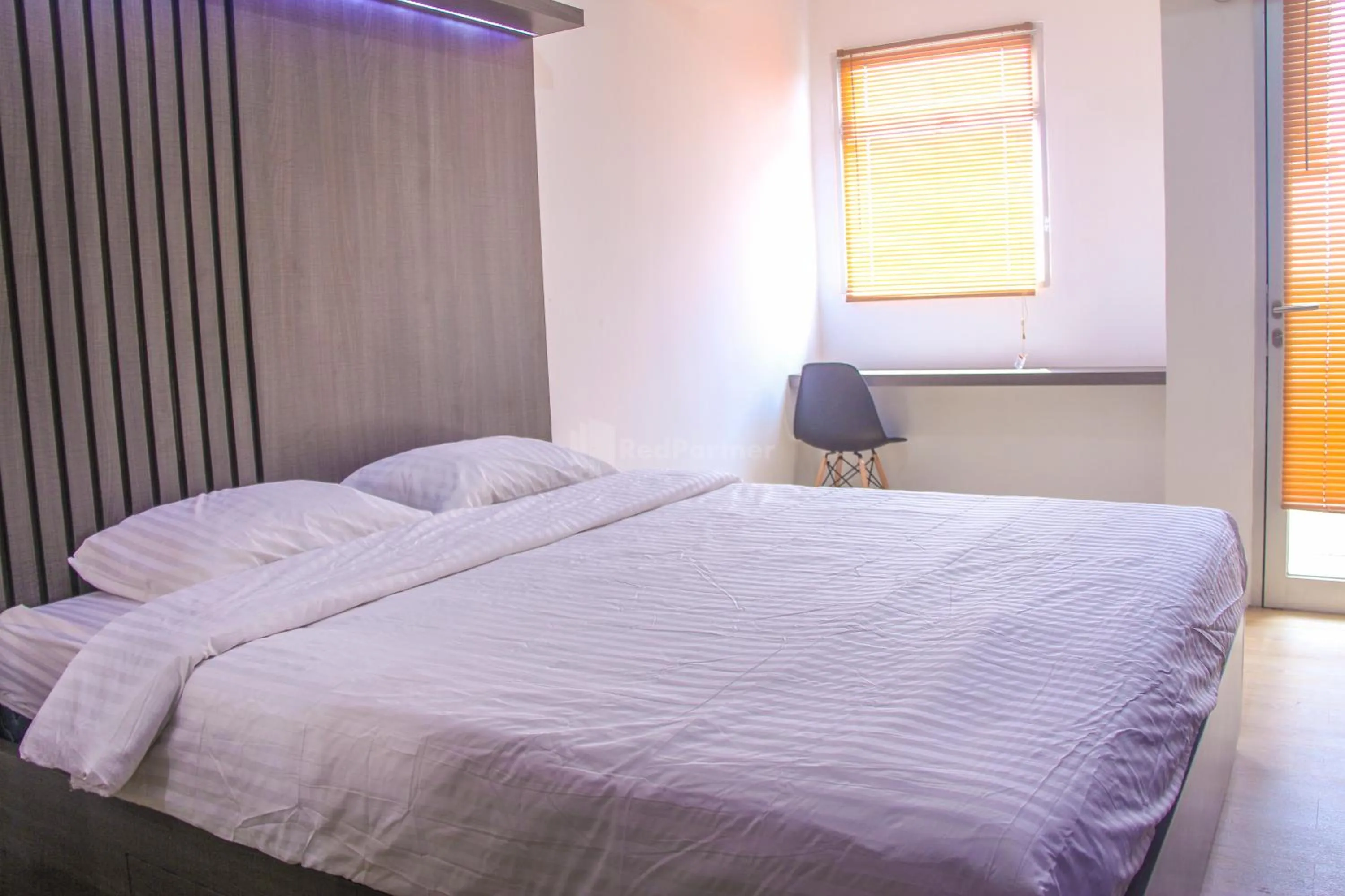 Bedroom in RedLiving Apartemen Gunung Putri Square - Abidin Room Tower Pinus