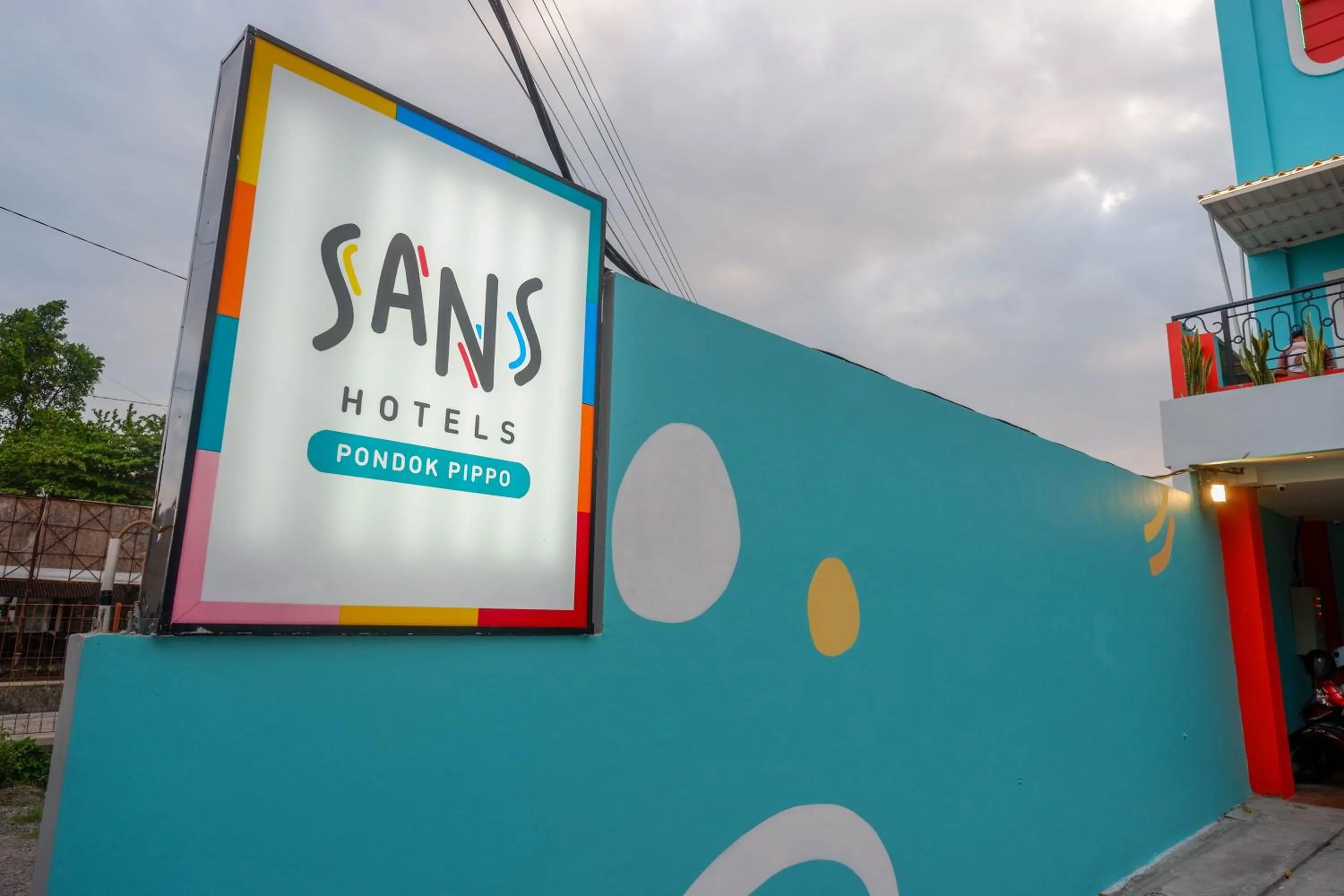 Property logo or sign in Sans Hotel Pippo Yogyakarta by RedDoorz