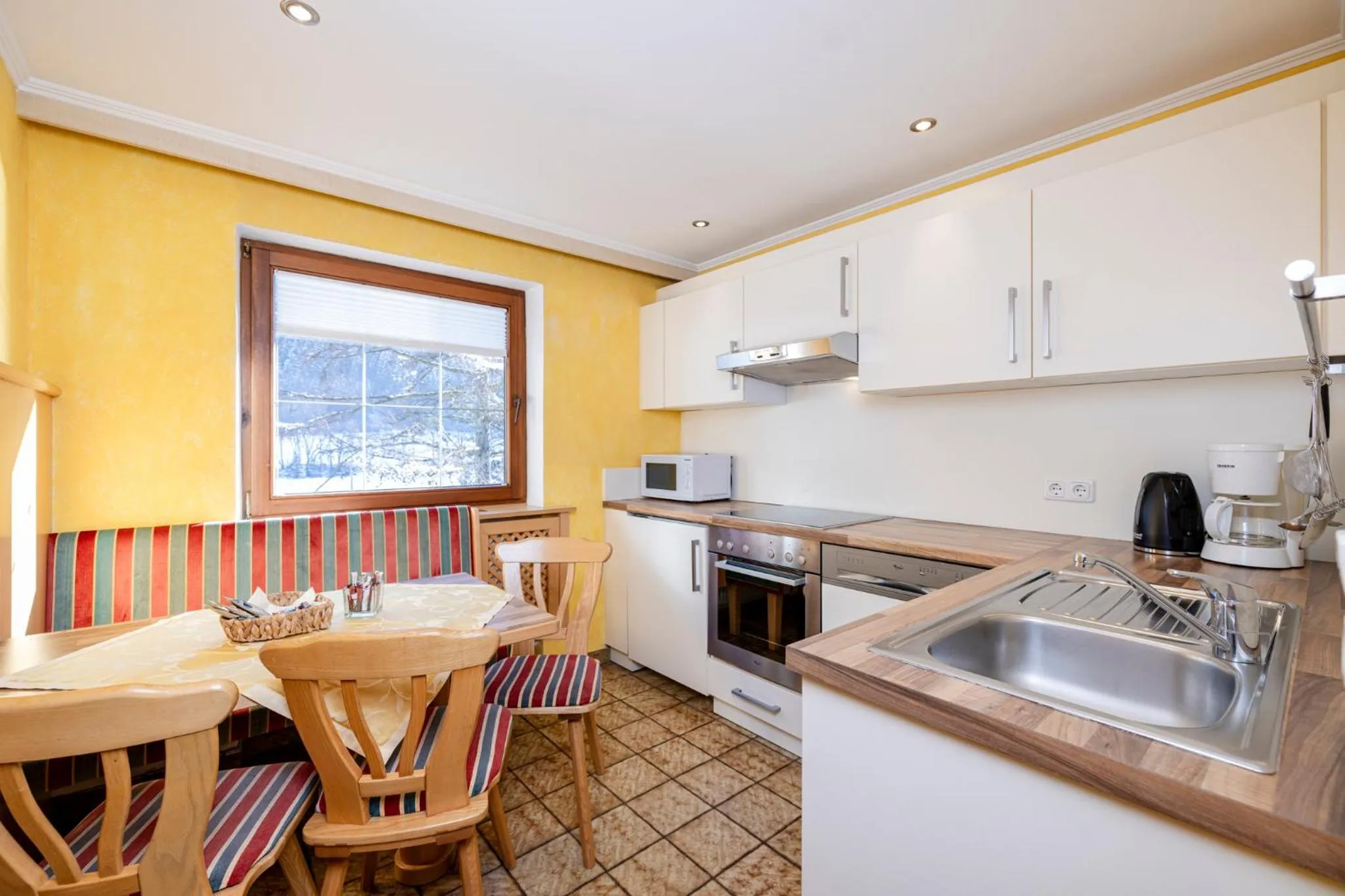 Kitchen or kitchenette in Aparthotel Landhaus St. Joseph (Indoor Pool)