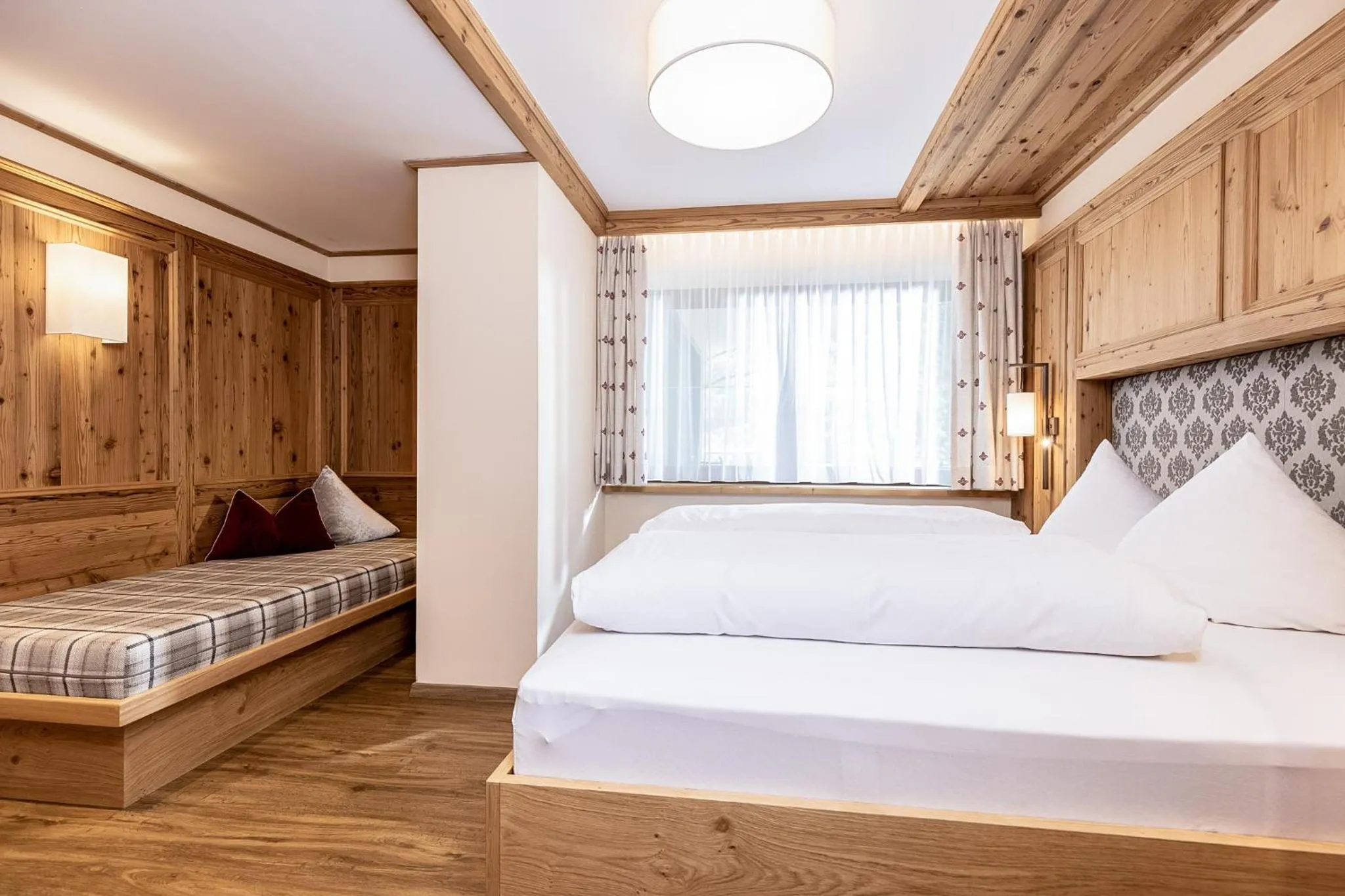 Photo of the whole room, Bed in Aparthotel Landhaus St. Joseph (Indoor Pool)