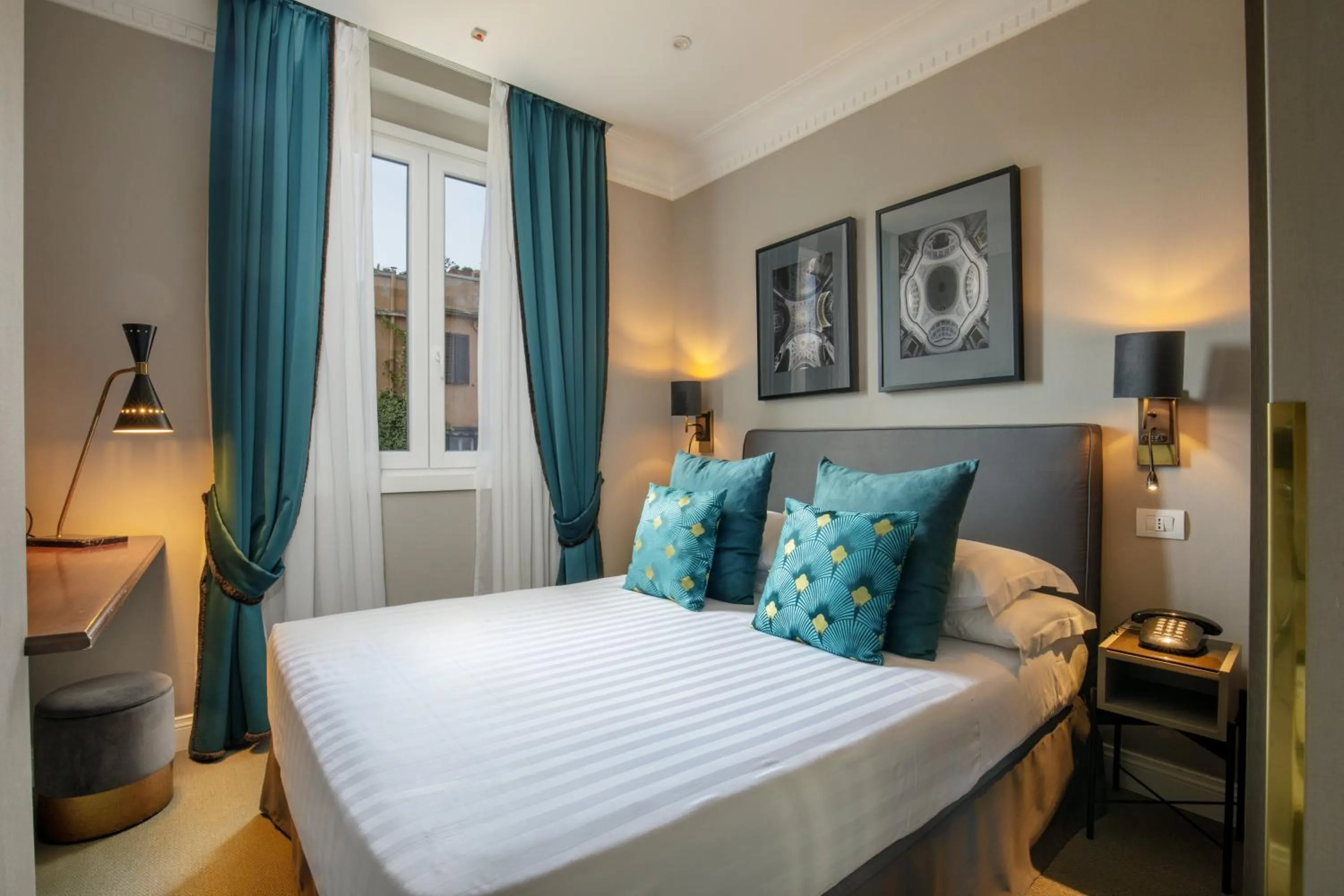 Bed in Condotti Boutique Hotel