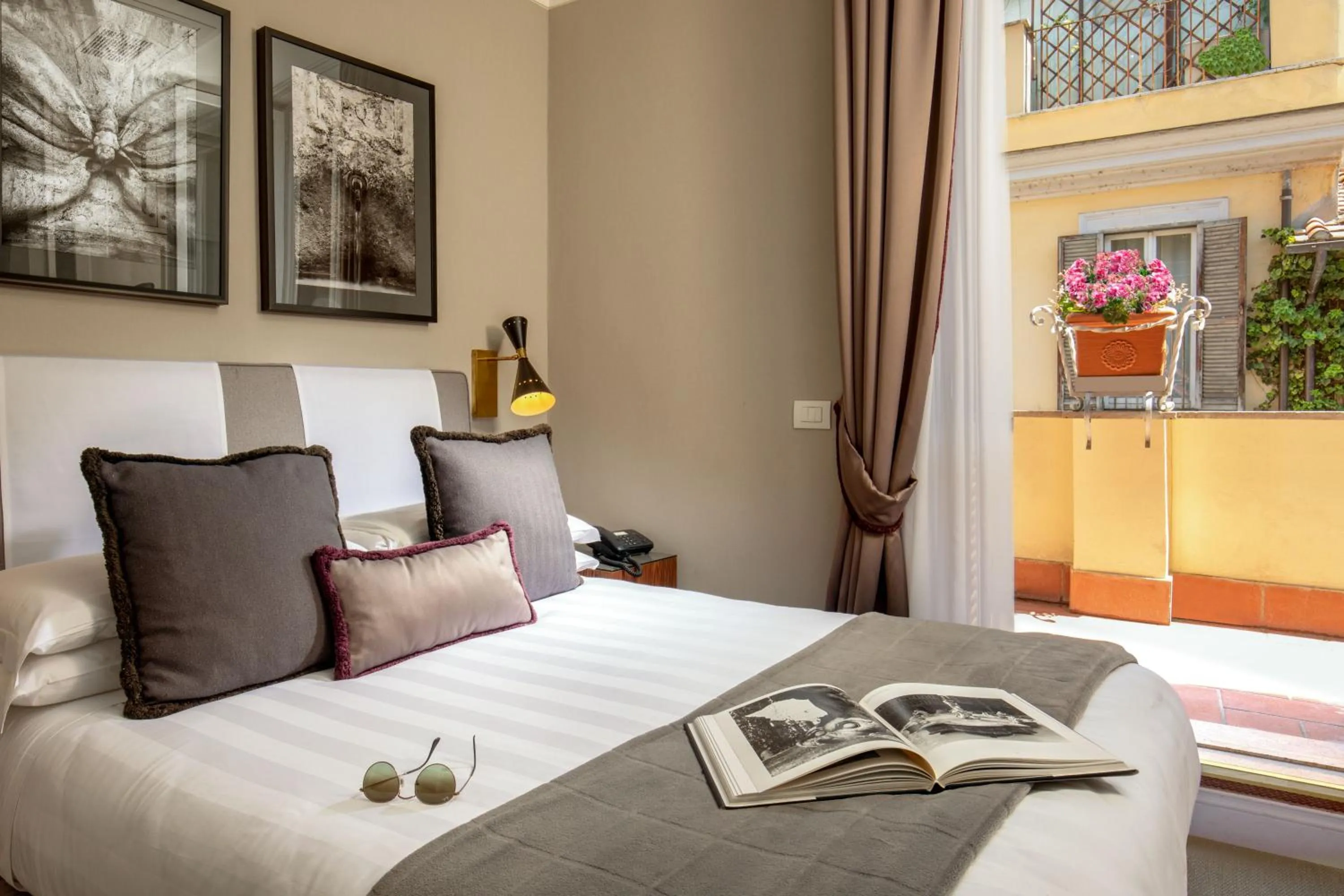 Bed in Condotti Boutique Hotel