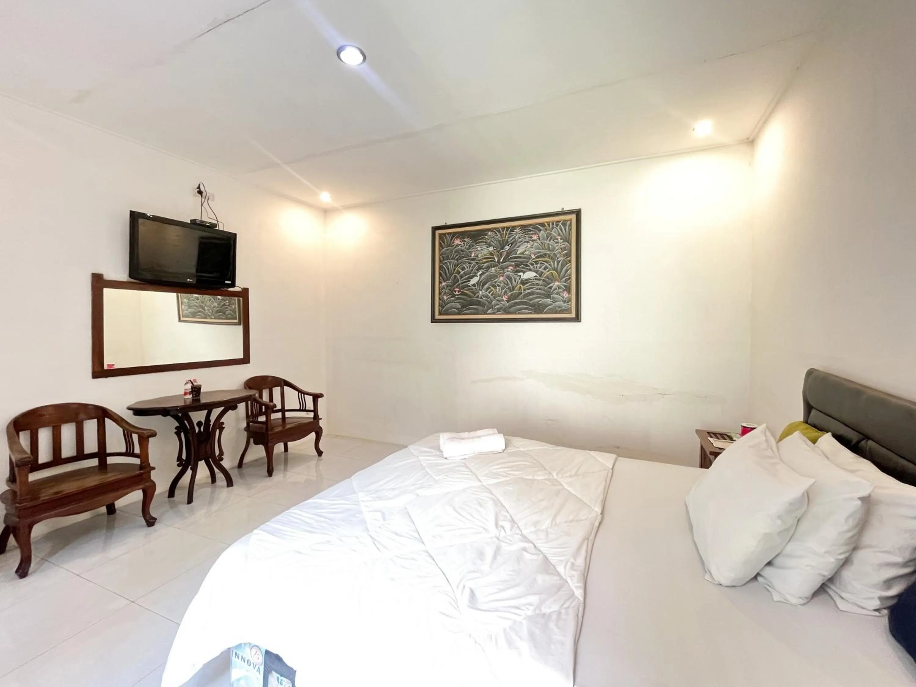 Bedroom, Bed in Urbanview Hotel Kumala Banyuwangi by RedDoorz