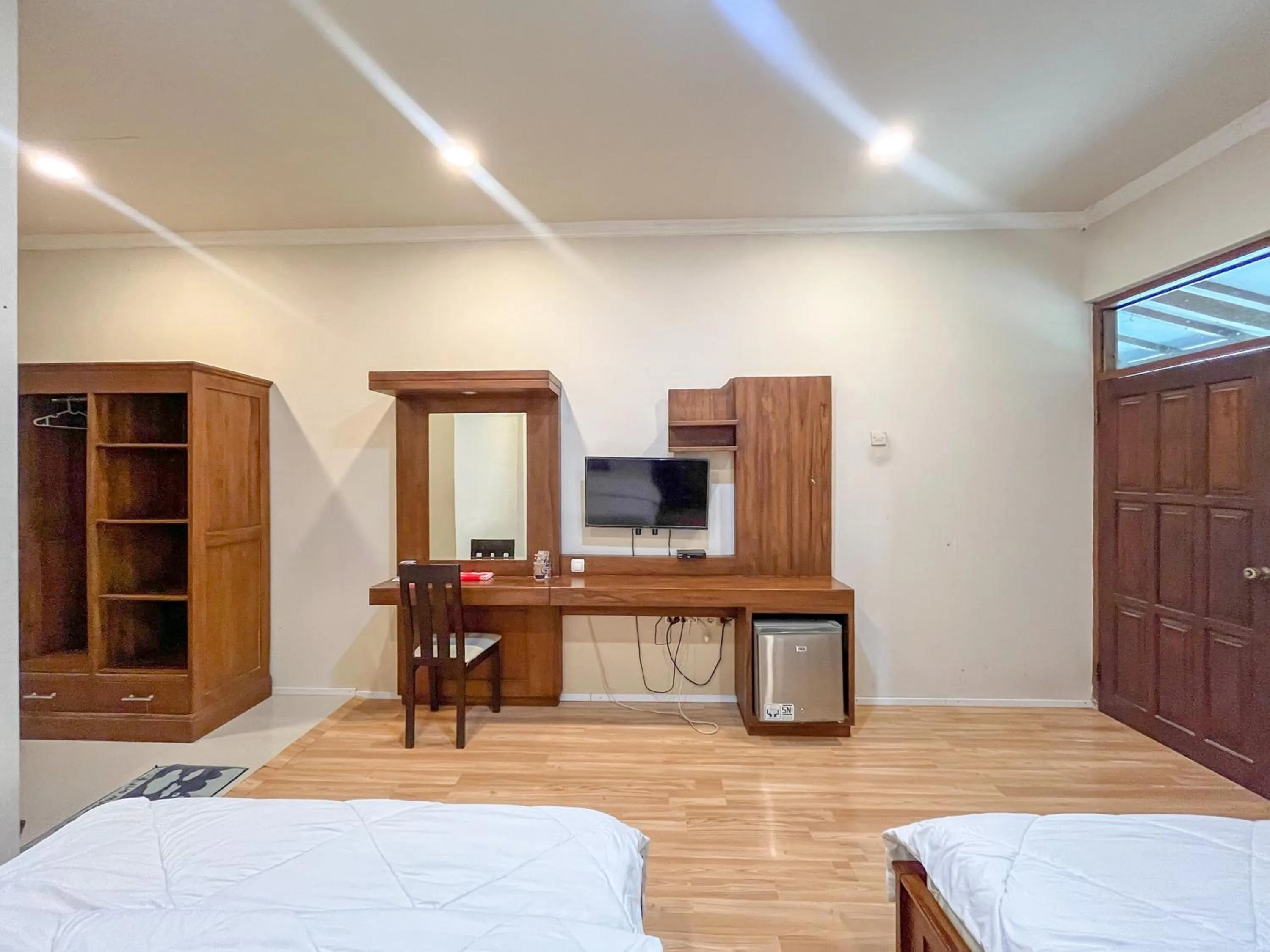 wardrobe, Bed in Urbanview Hotel Kumala Banyuwangi by RedDoorz