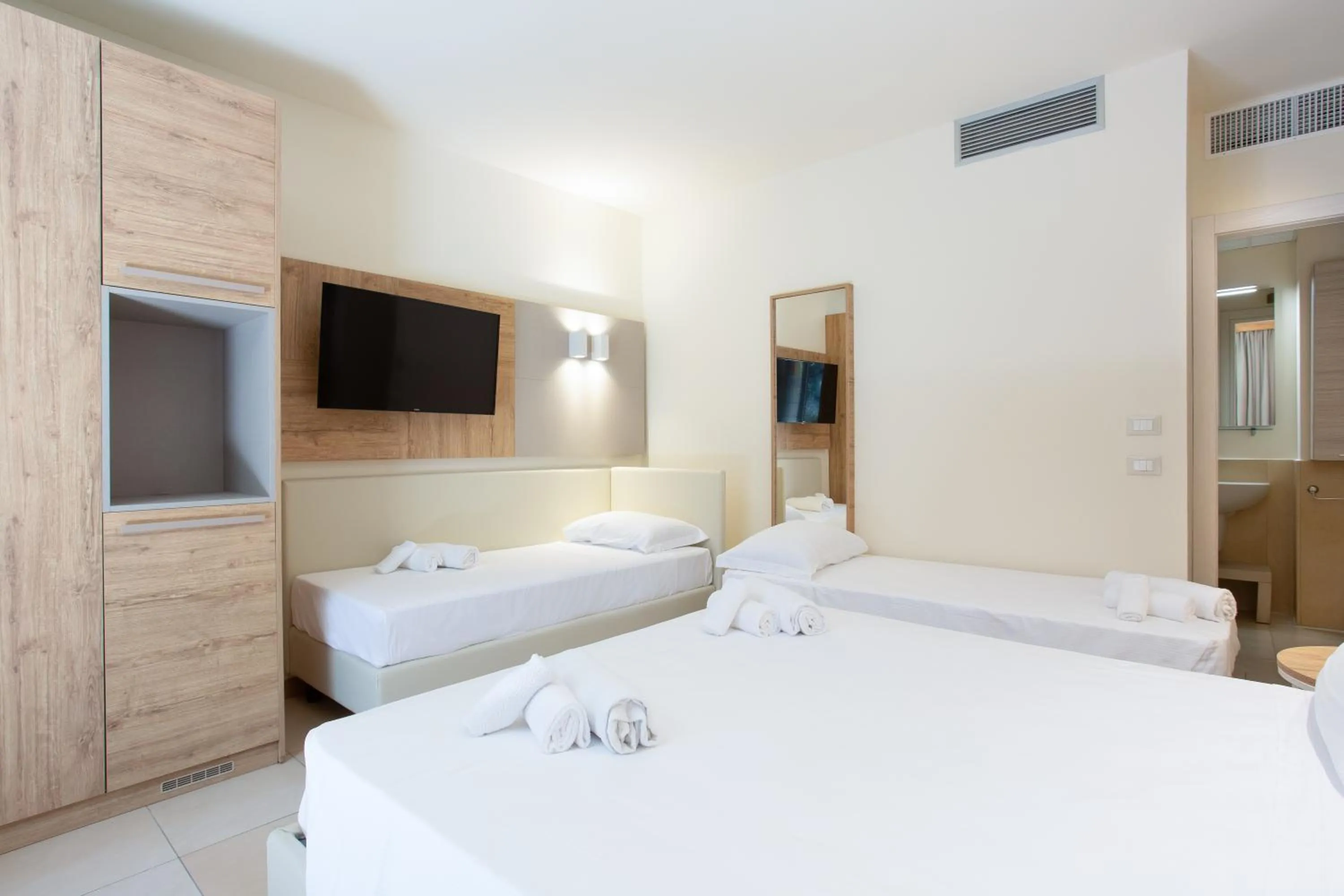 Bed in Canado Family Hotel