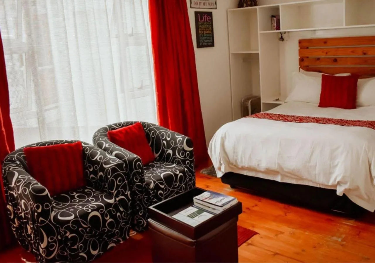 Seating area, Bed in Knock Out View Clarens