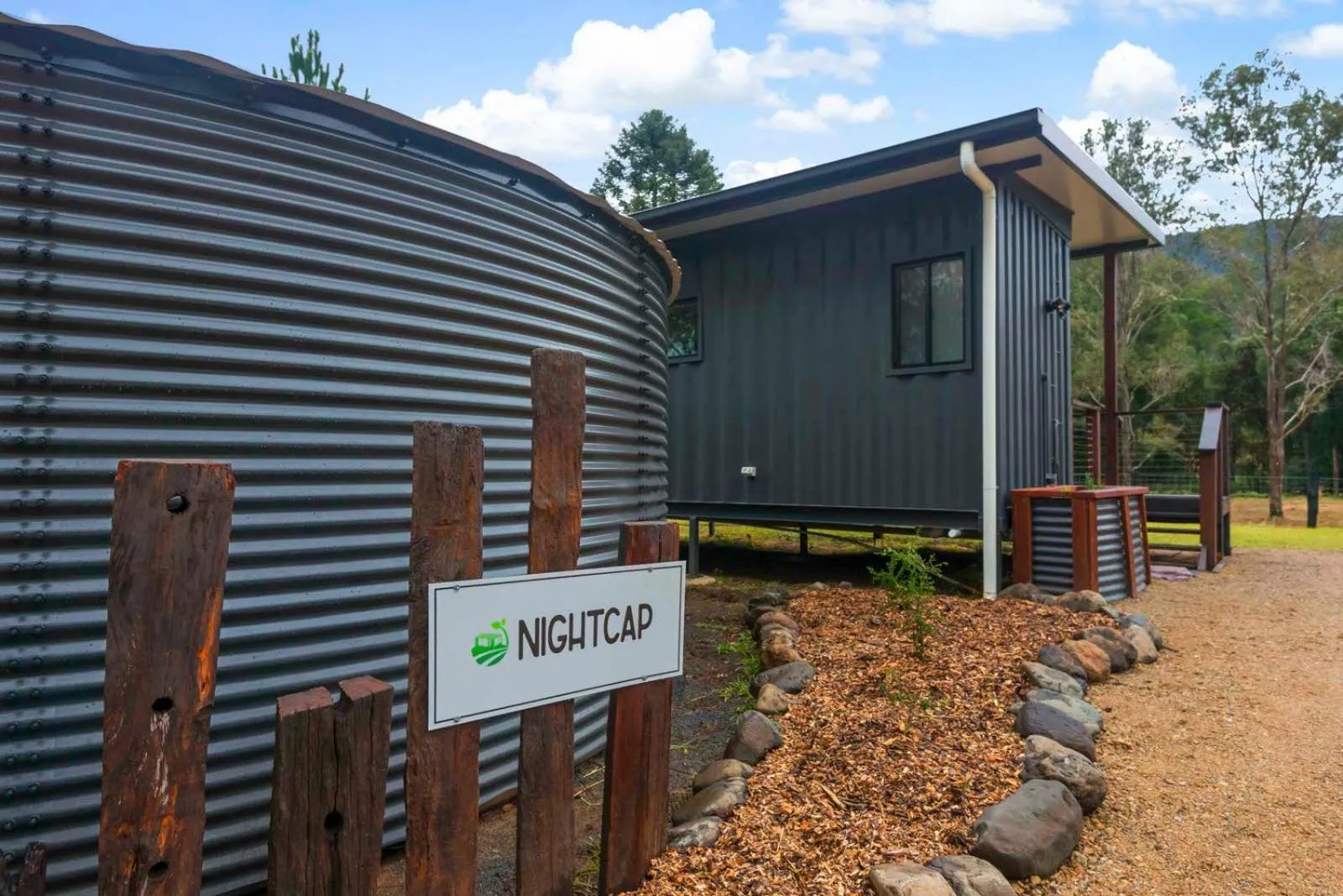 Property logo or sign in Contained in Nimbin Accommodation