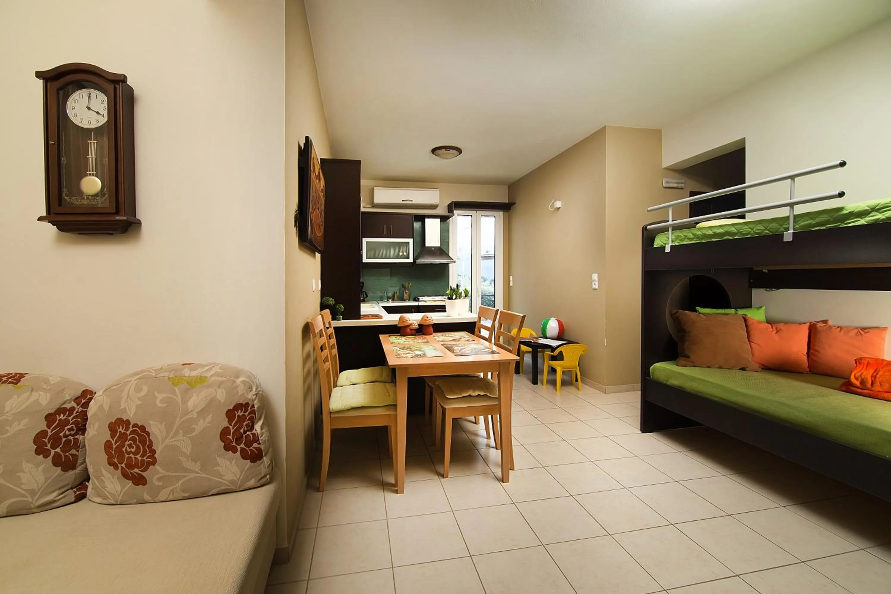 Dining area, Bed in Home Suites