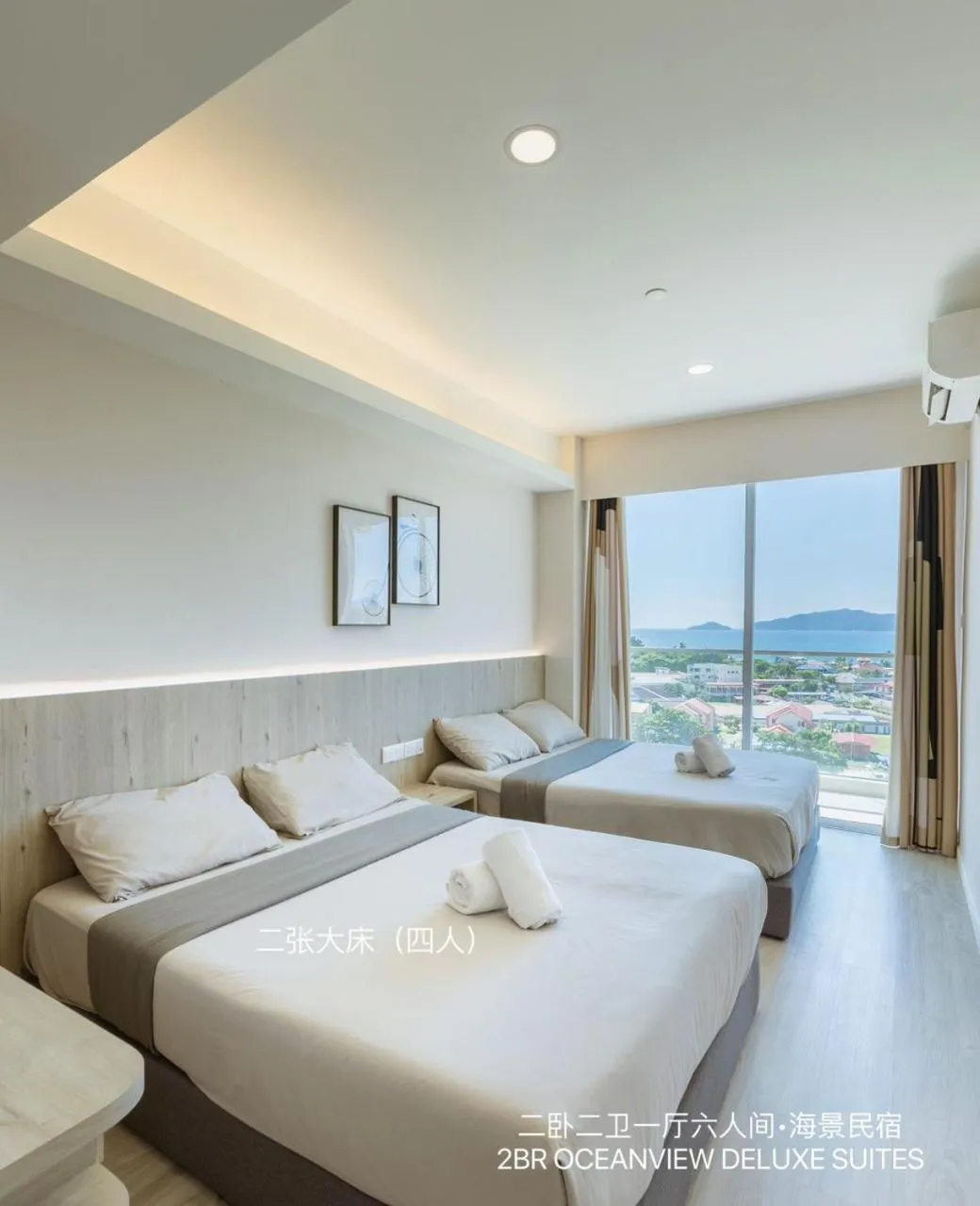 Bed in QUEENSLAND SUITES at Aru Suites, Kota Kinabalu