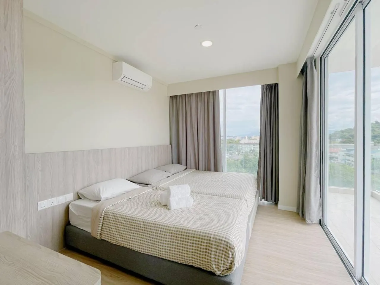 Bedroom, Bed in QUEENSLAND SUITES at Aru Suites, Kota Kinabalu