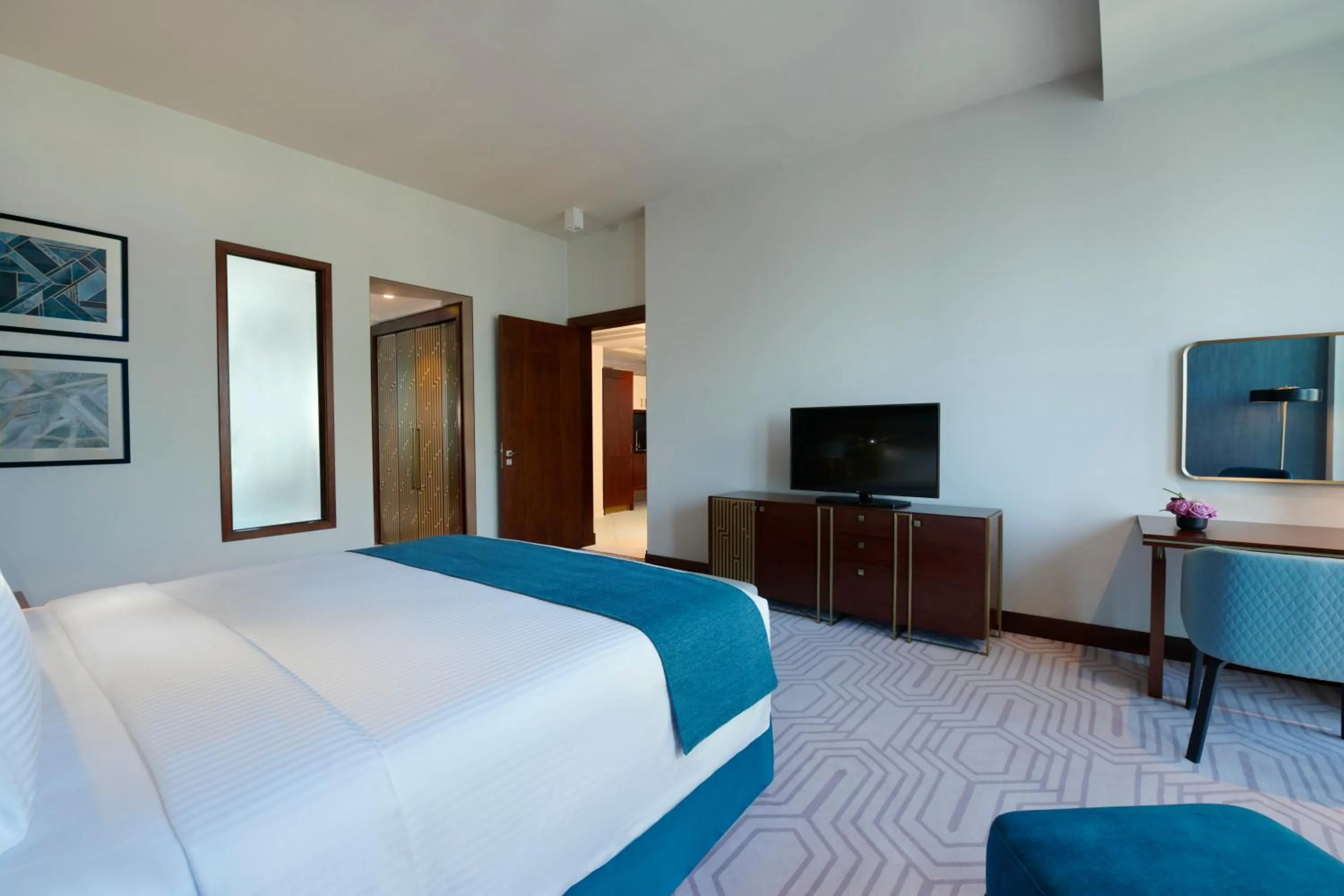 Photo of the whole room, Bed in Wyndham Grand Doha West Bay Beach
