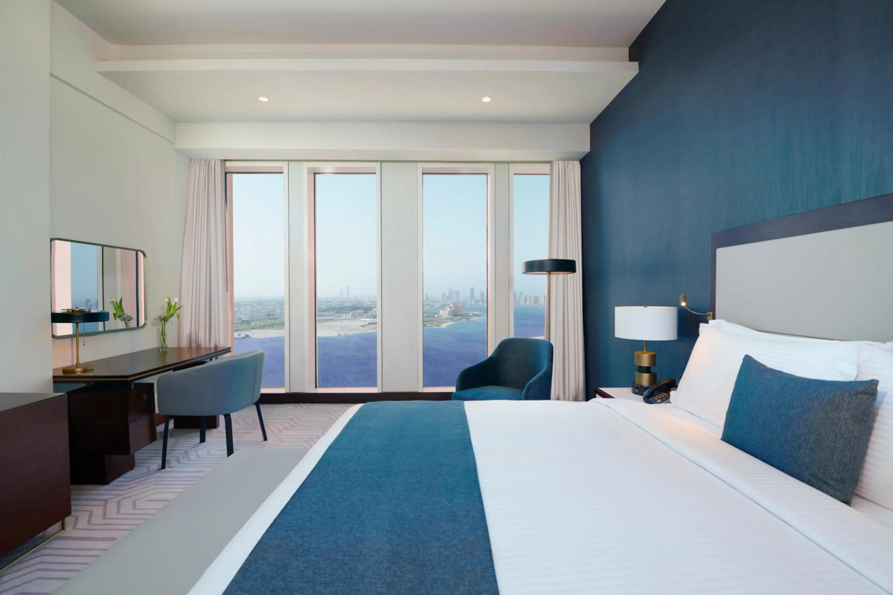 Photo of the whole room, Bed in Wyndham Grand Doha West Bay Beach