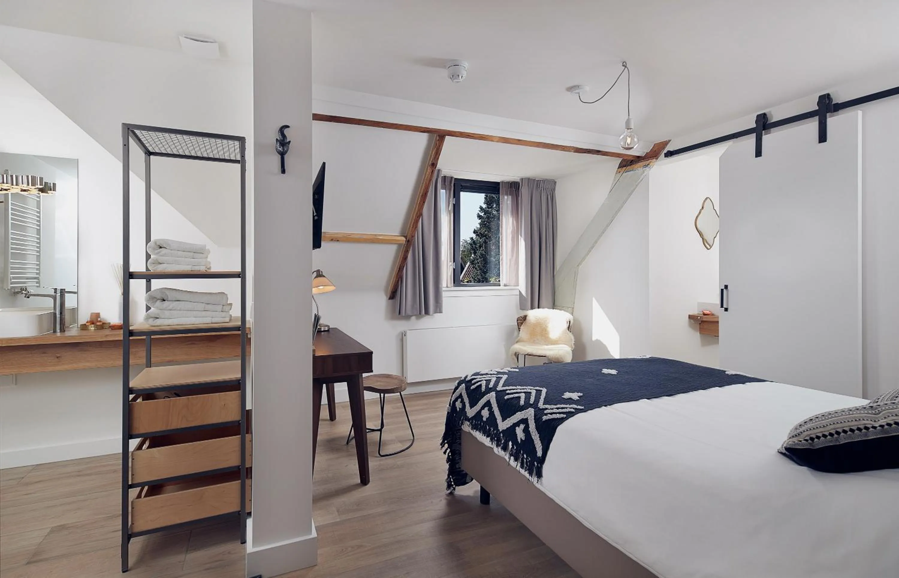 Bed in Boutique Hotel Bellevue