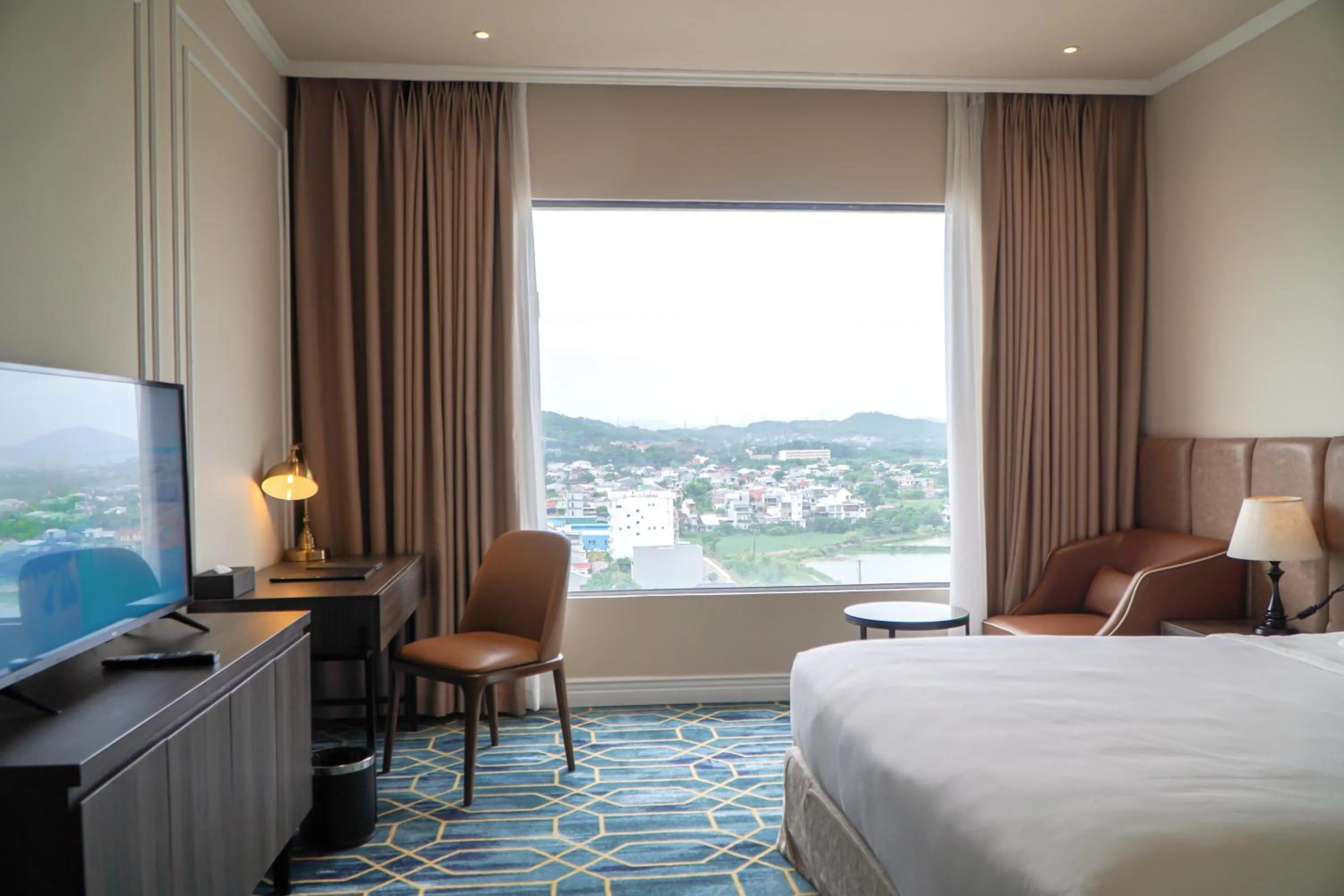 View (from property/room), Bed in La Vela Hue Hotel