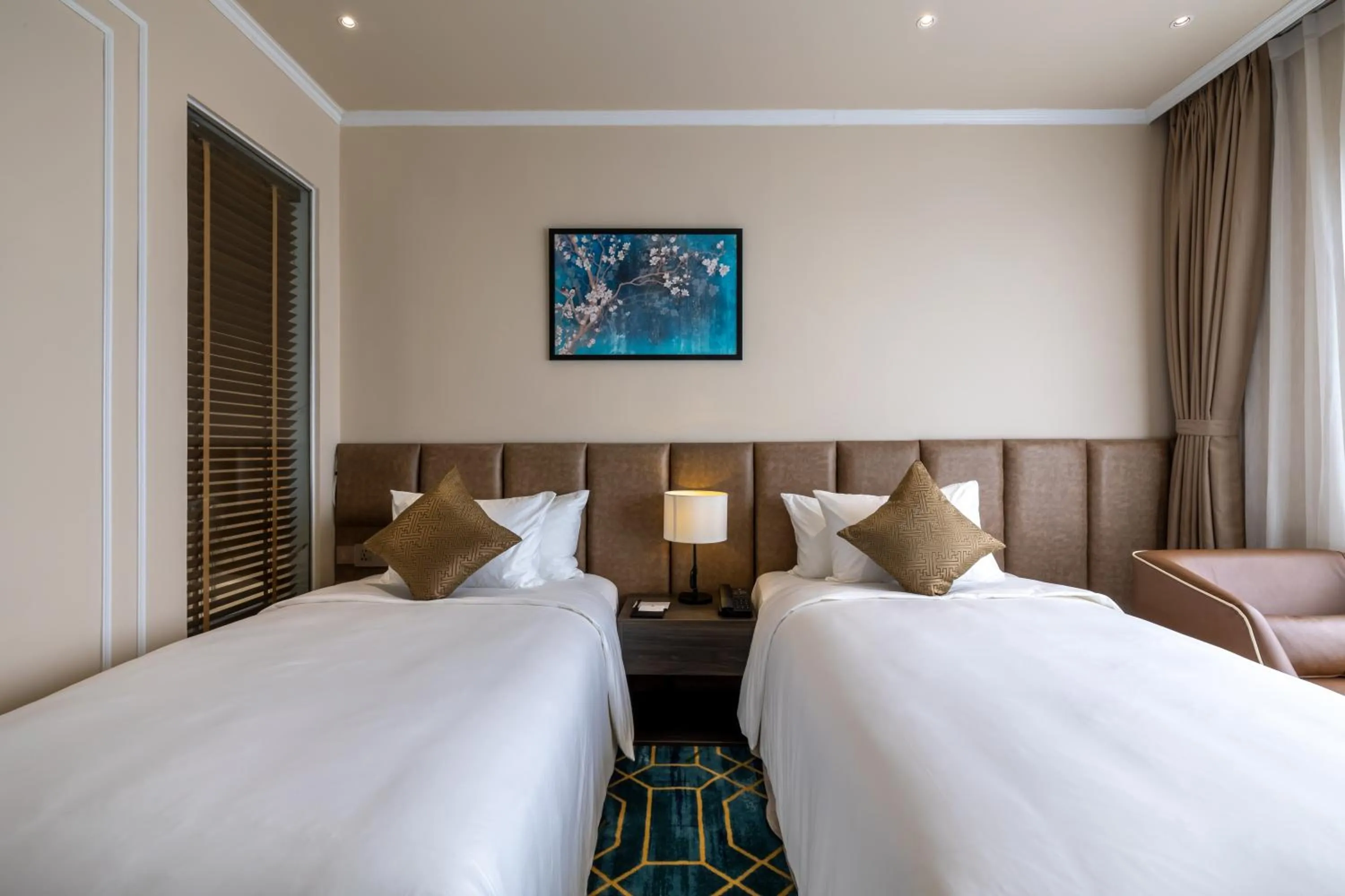 Bed in La Vela Hue Hotel