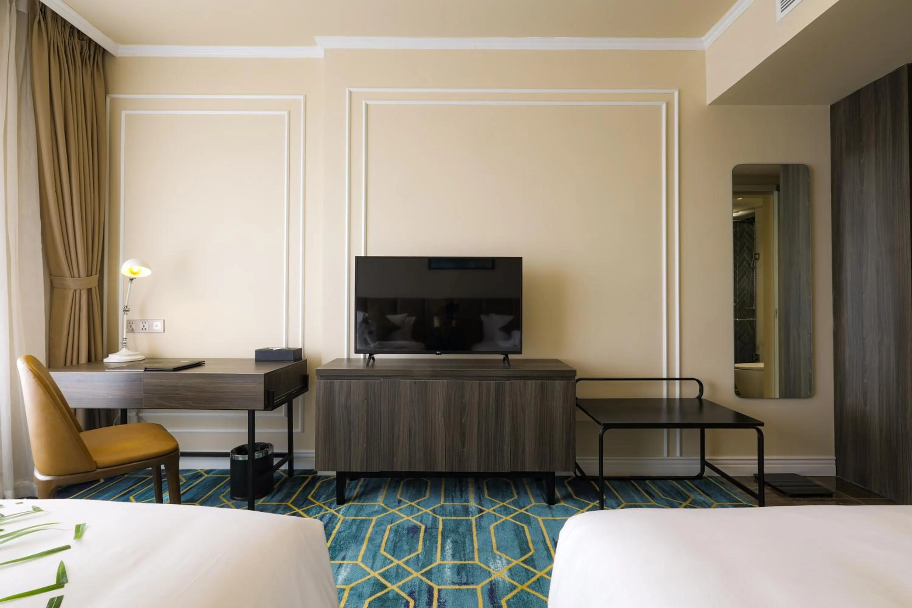 TV and multimedia, Bed in La Vela Hue Hotel