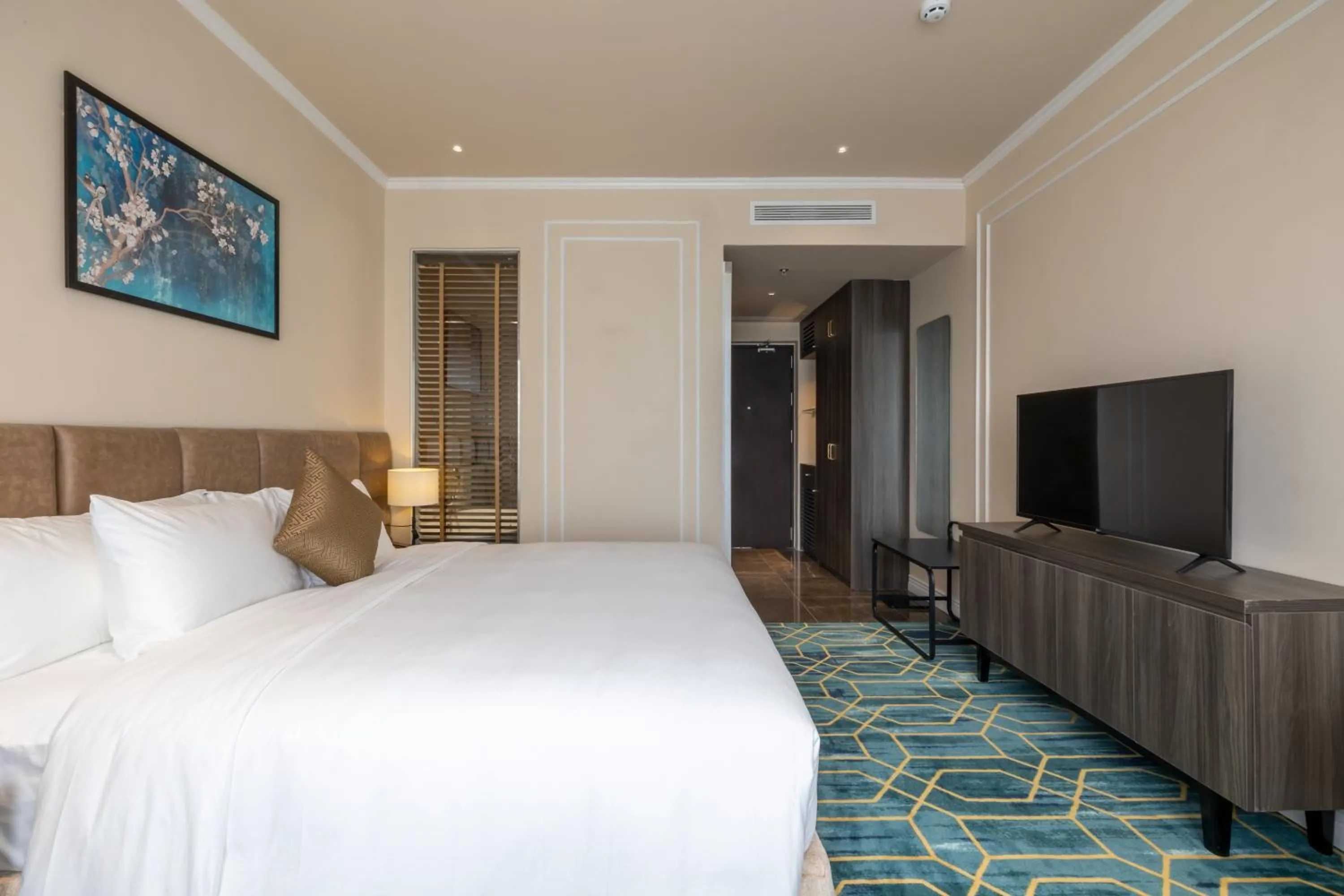 Bed in La Vela Hue Hotel