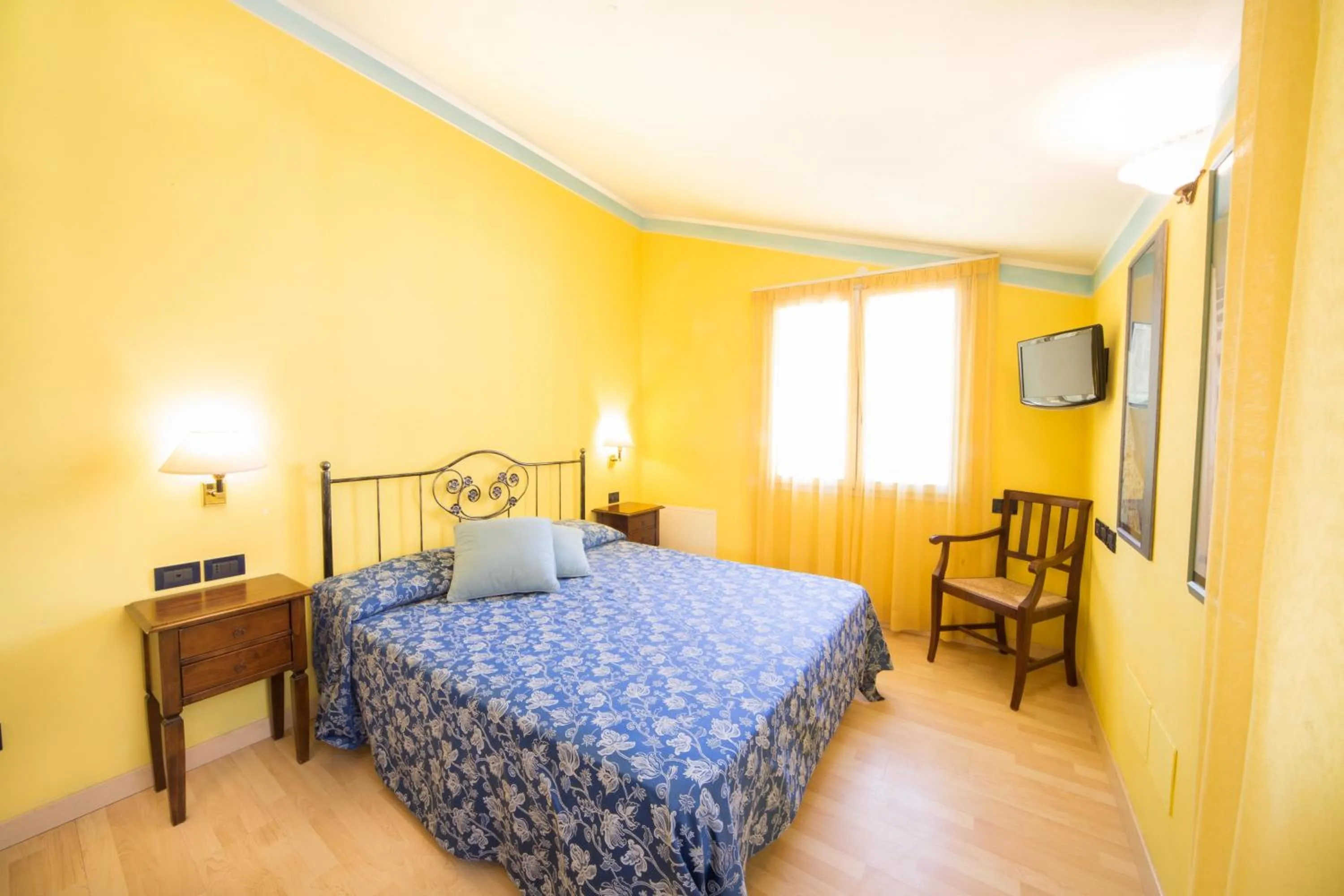 Bed in World Village Apartments