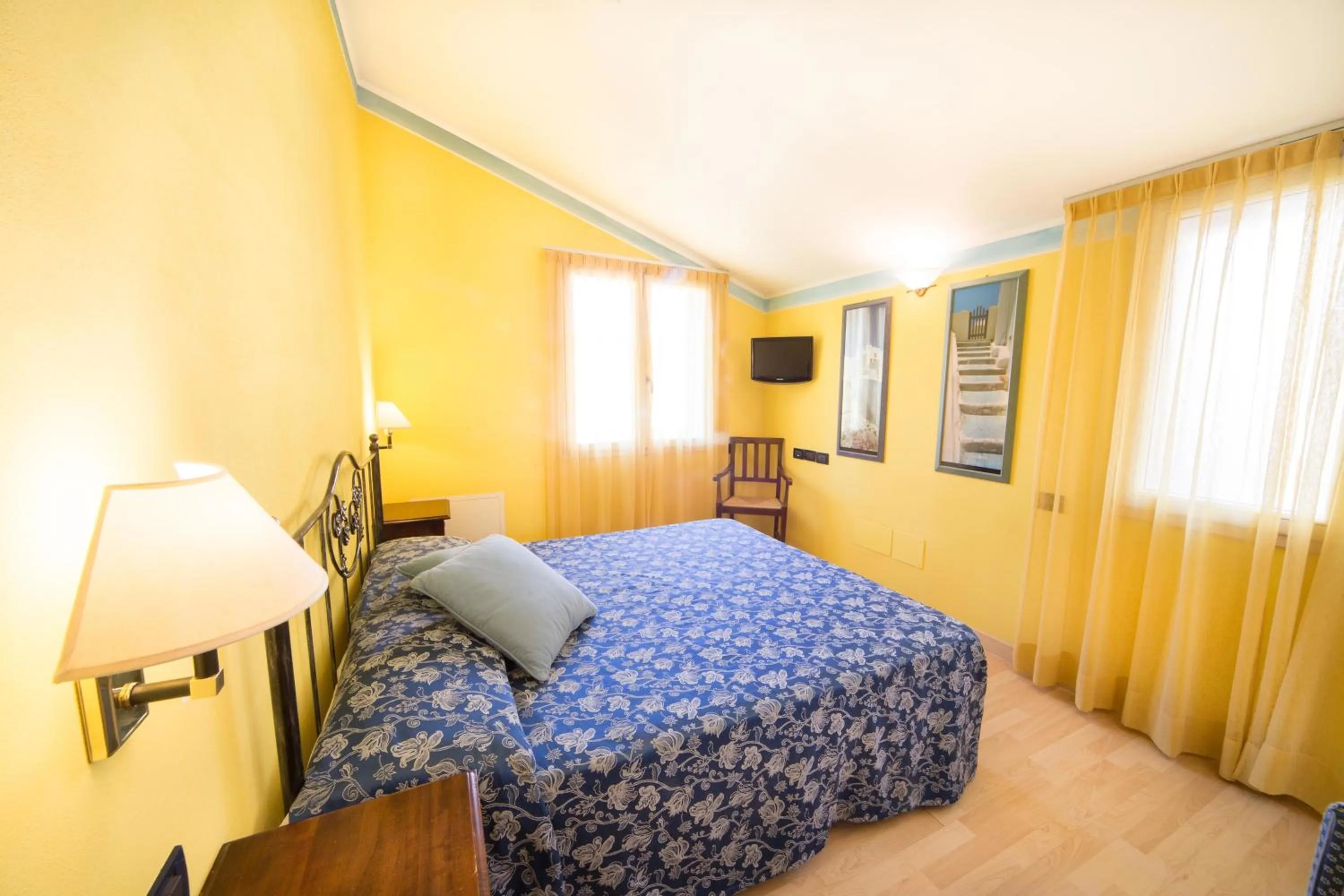 Bed in World Village Apartments