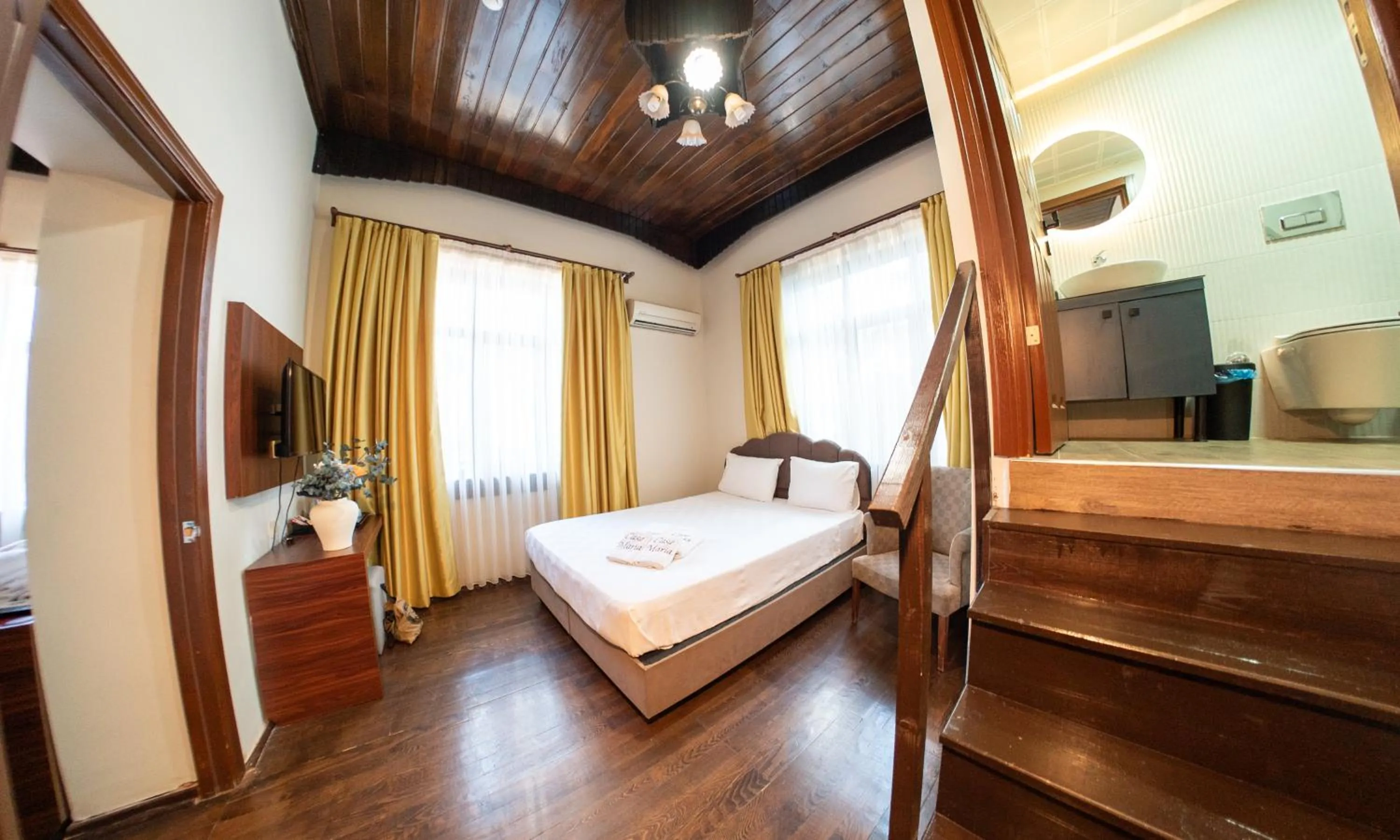 Bed in Casa Maria Hotel