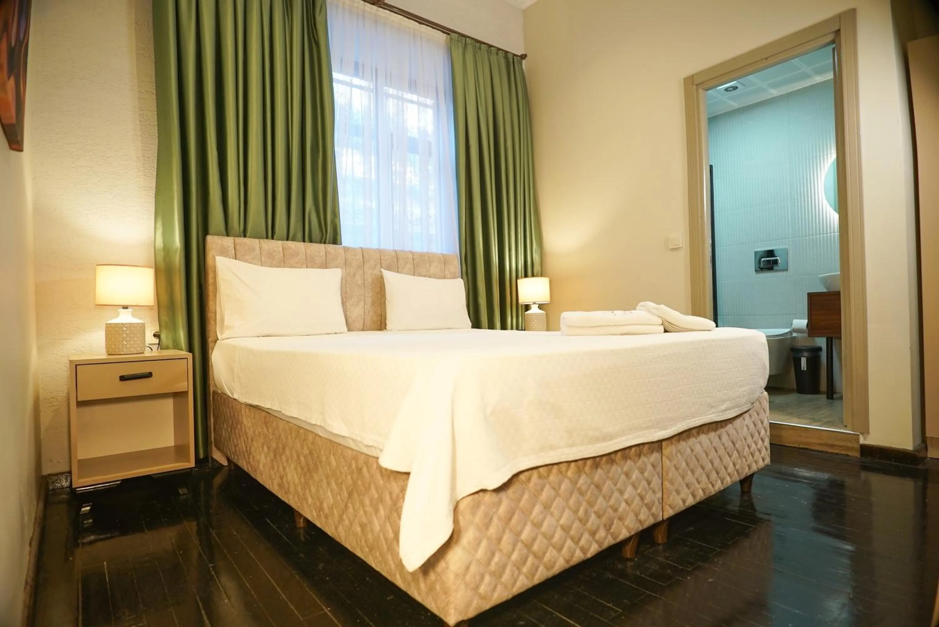 Bed in Casa Maria Hotel