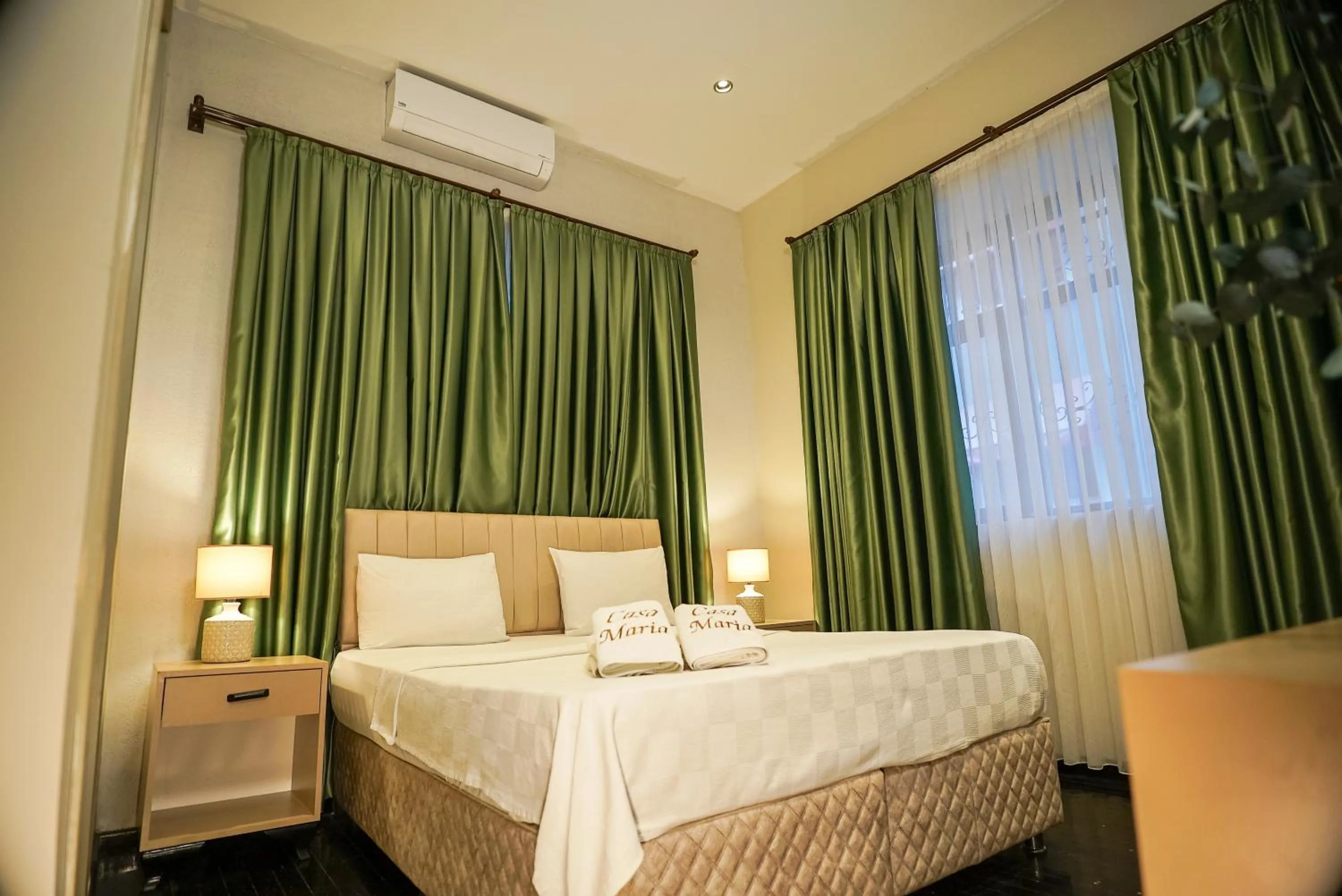 Bed in Casa Maria Hotel