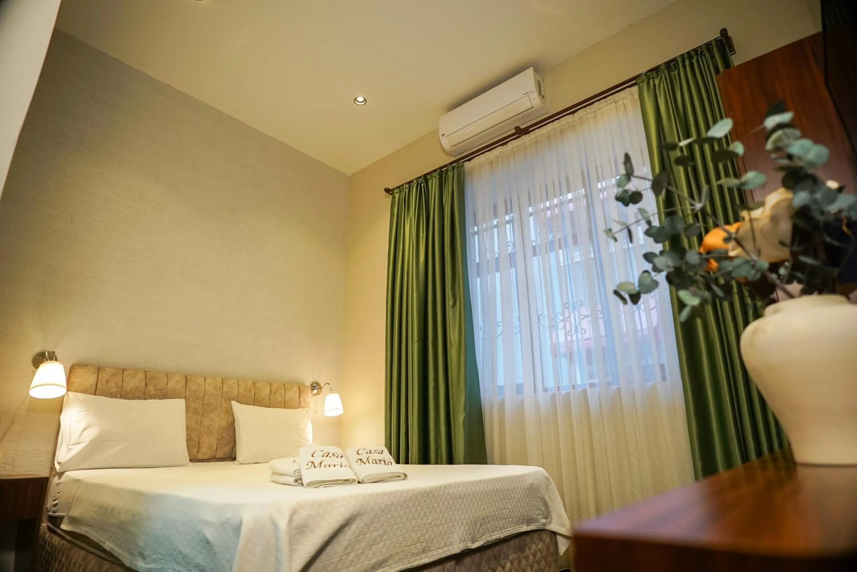 Bed in Casa Maria Hotel