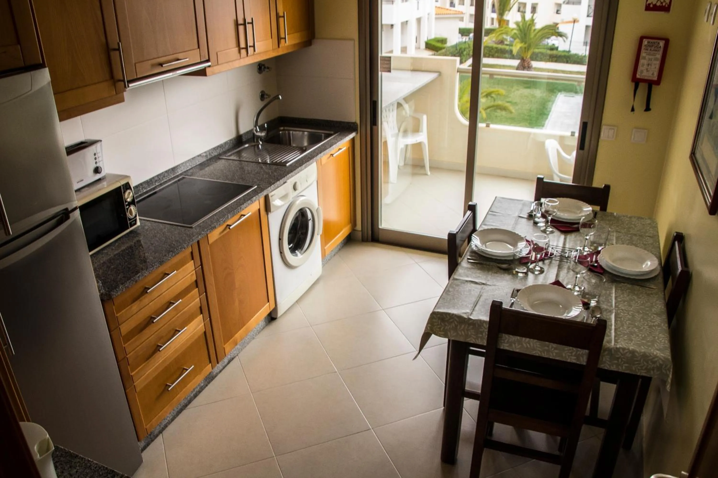 Communal kitchen in Apartamentos Vista Mar