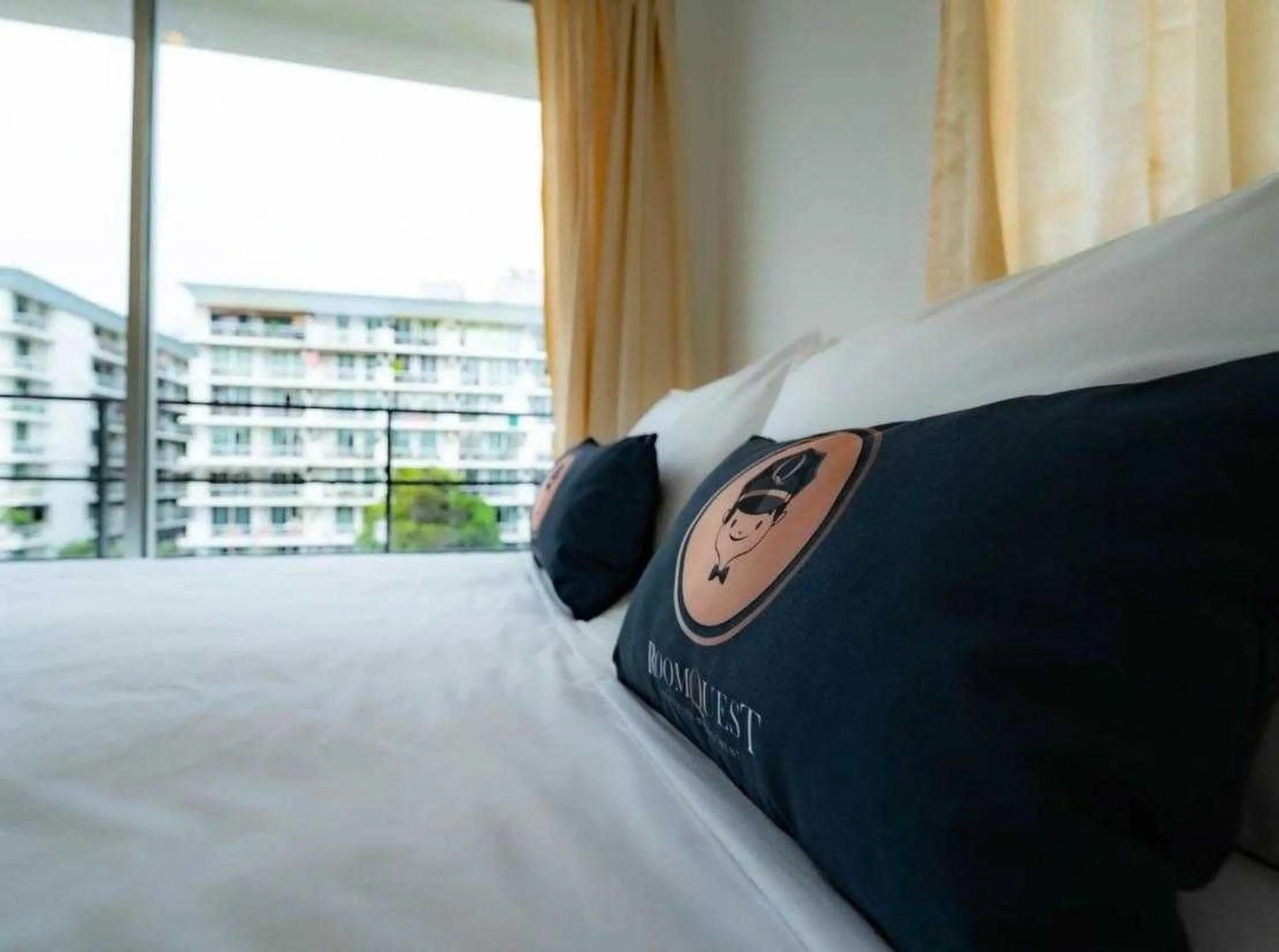 Bed in RQ Bangkok Sukhumvit 50 by Collection O