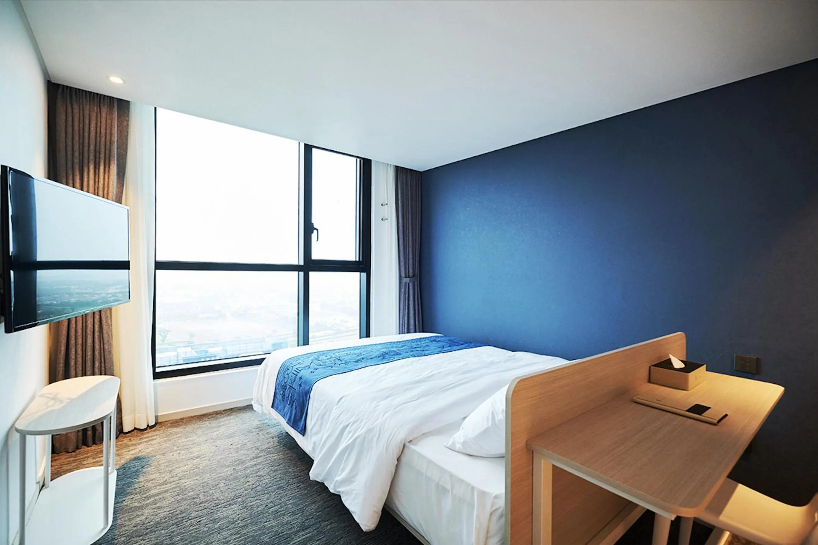 Bed in Jeju Pureun Hotel