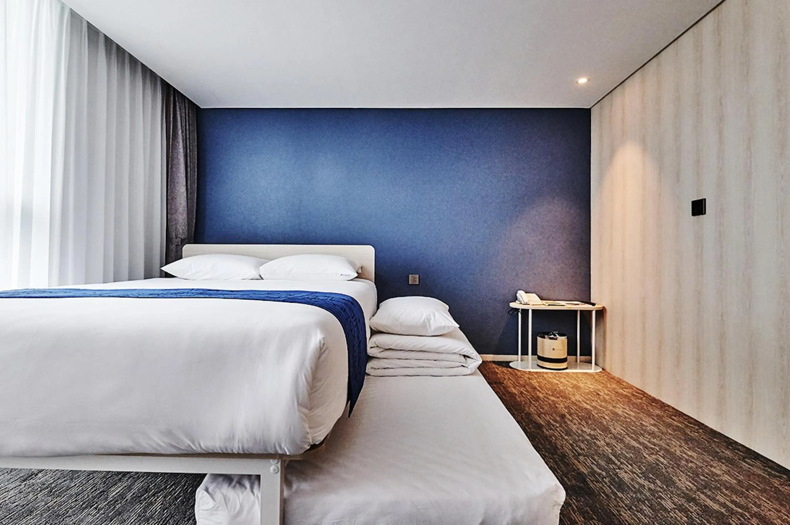 Bed in Jeju Pureun Hotel