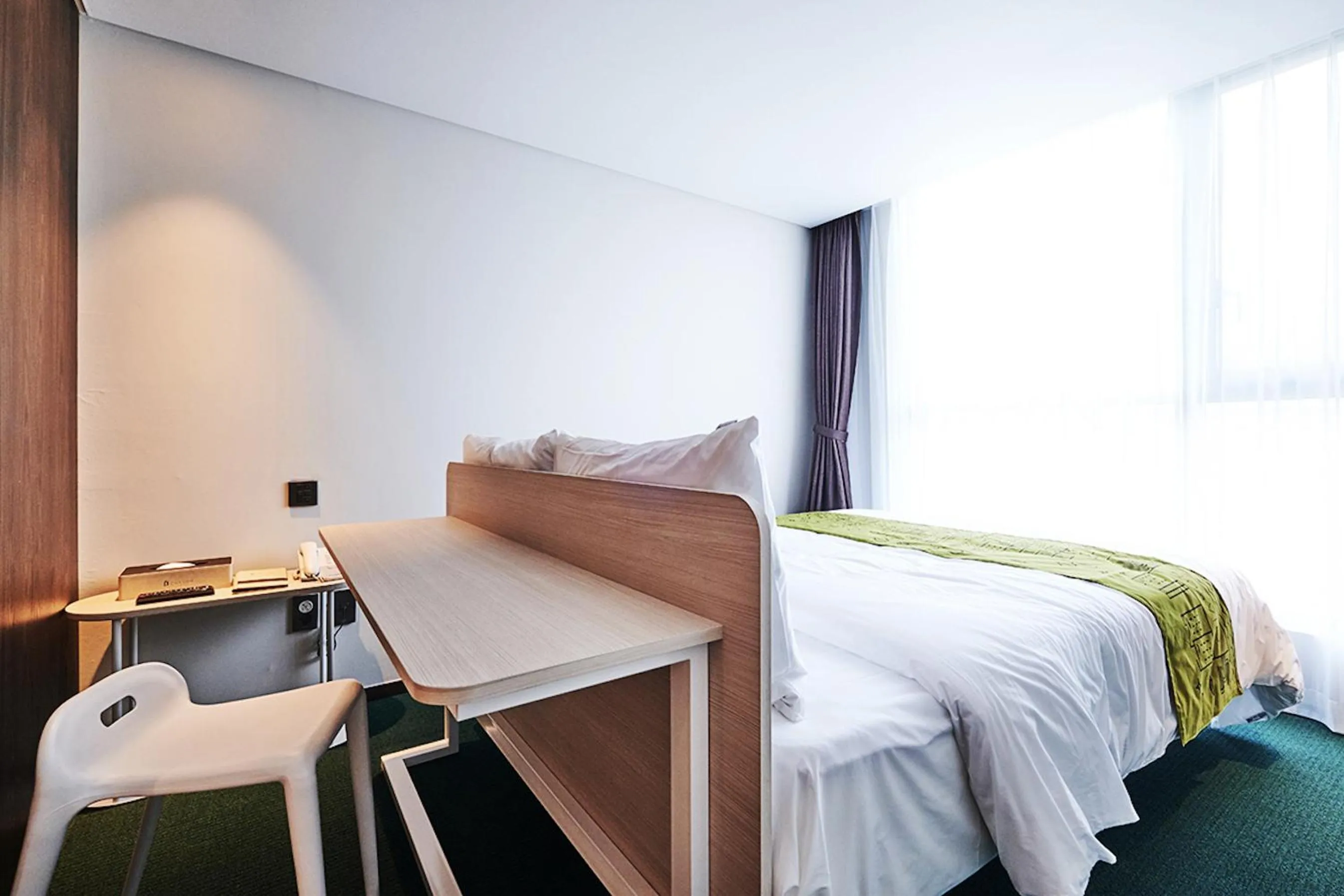 Bed in Jeju Pureun Hotel