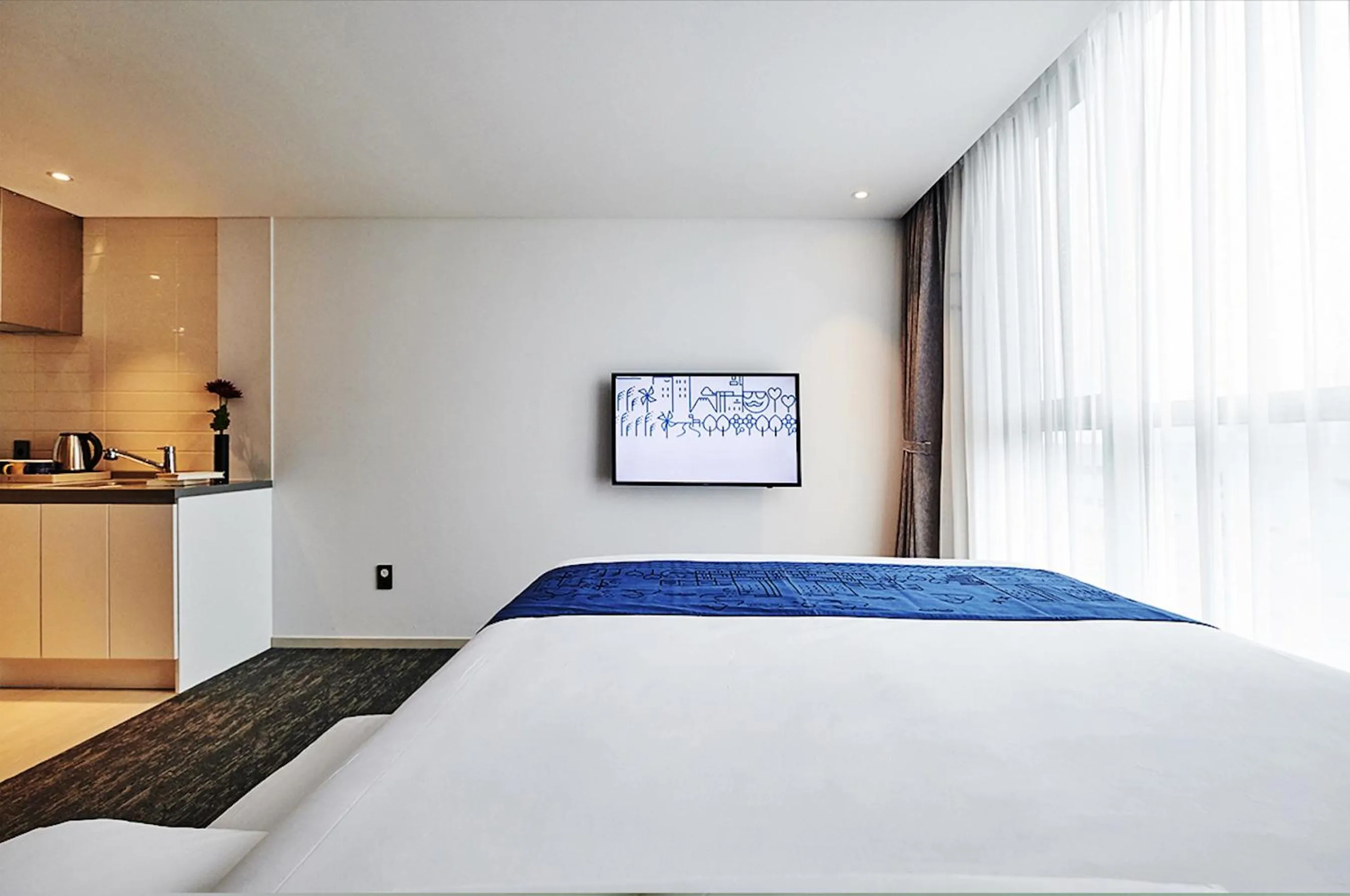 Bed in Jeju Pureun Hotel