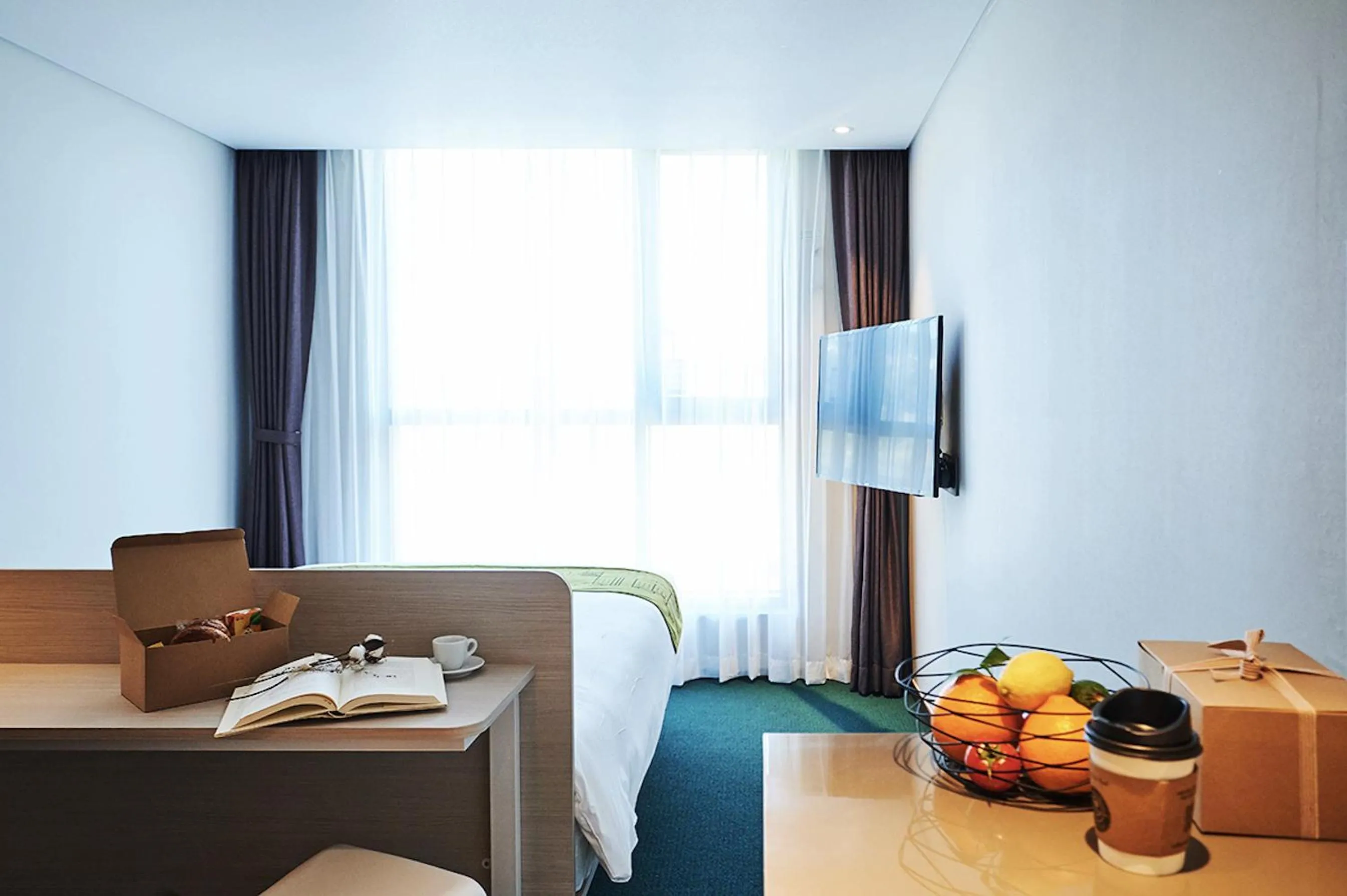 Bed in Jeju Pureun Hotel