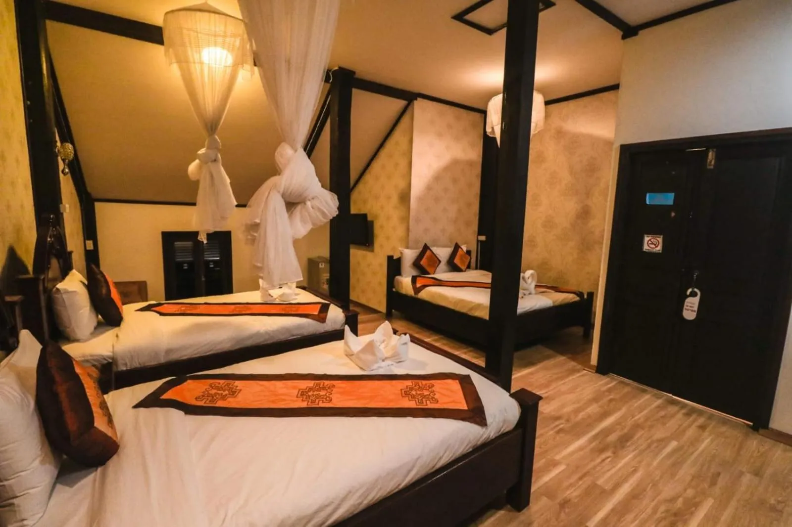 Bed in Ananta Hotel Luangprabang