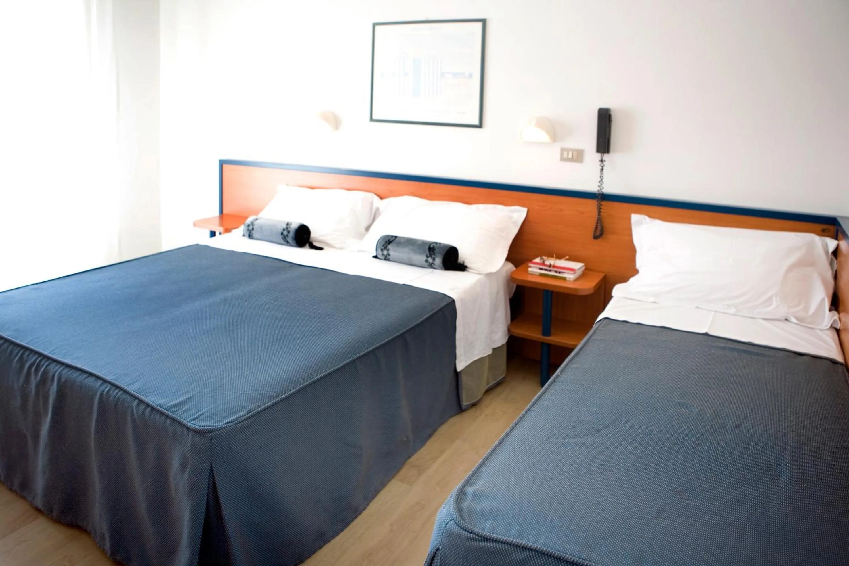 Bed in Hotel Tiffany & Resort