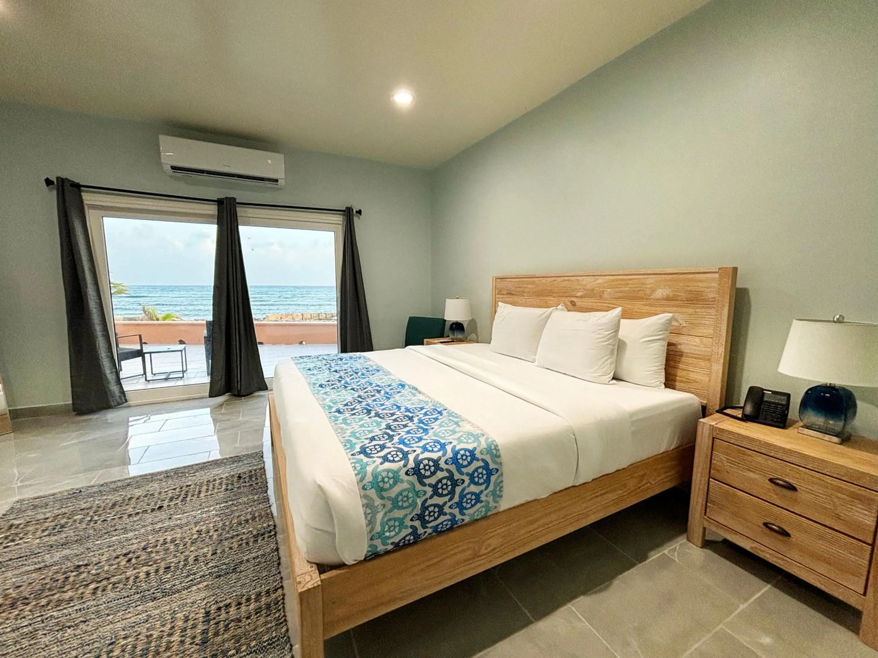 Bed in Grapetree Bay Hotel and Villas