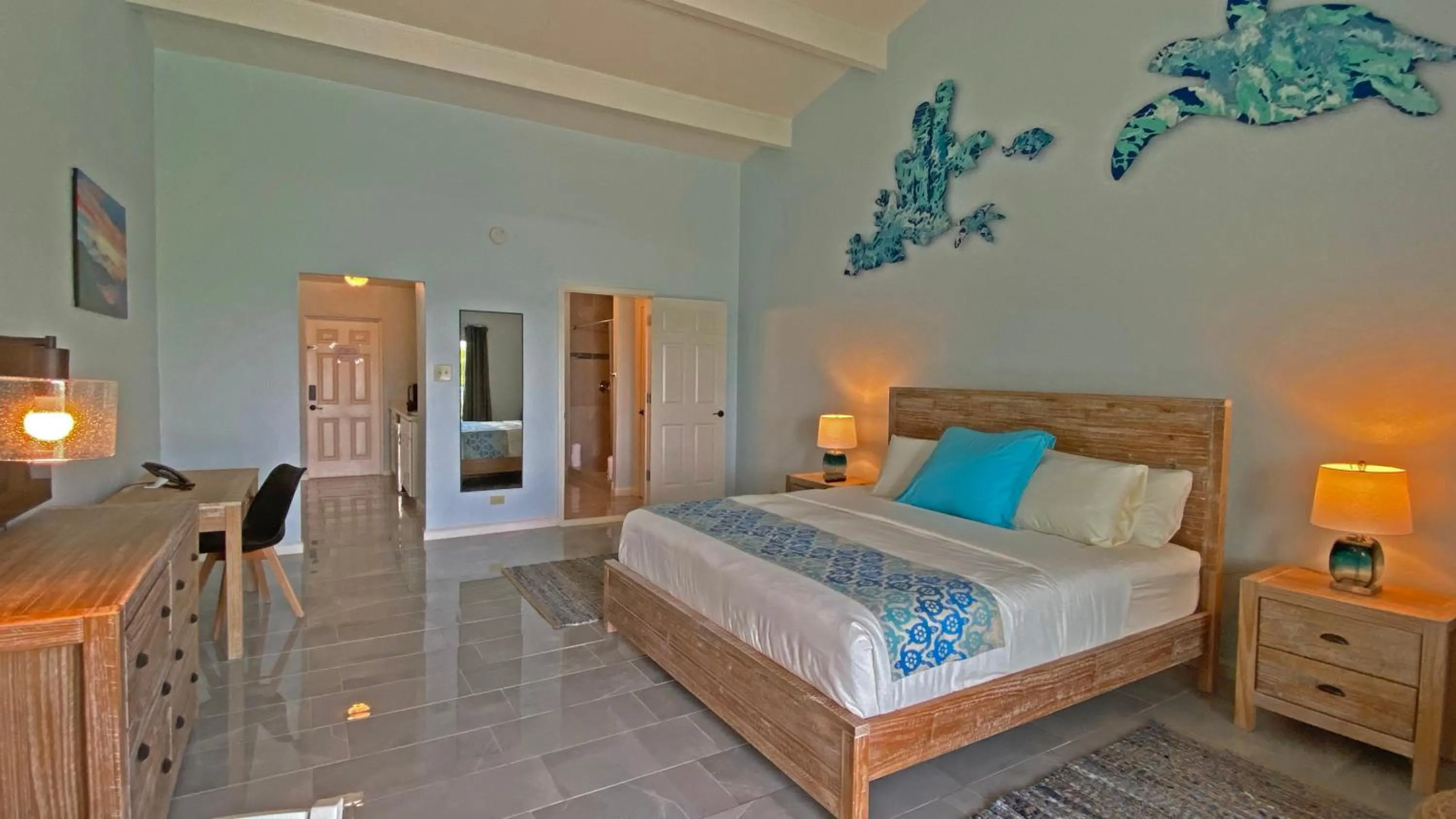 Bed in Grapetree Bay Hotel and Villas